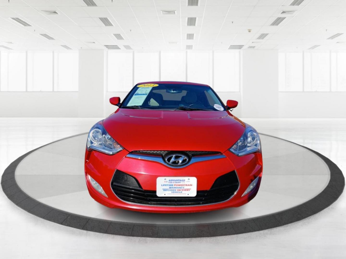 2013 Boston Red Metallic Hyundai Veloster Base (KMHTC6ADXDU) with an 1.6L L4 DOHC 16V engine, located at 401 Woodman Dr, Riverside, OH, 45431, (937) 908-9800, 39.760899, -84.123421 - Photo#6