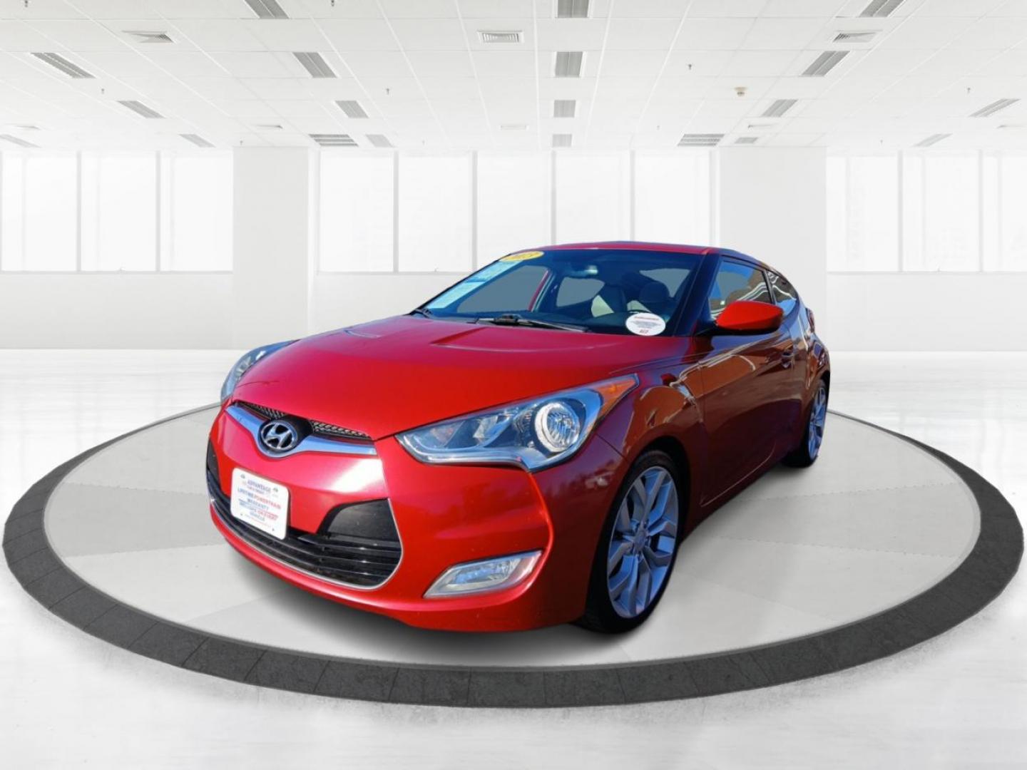 2013 Boston Red Metallic Hyundai Veloster Base (KMHTC6ADXDU) with an 1.6L L4 DOHC 16V engine, located at 401 Woodman Dr, Riverside, OH, 45431, (937) 908-9800, 39.760899, -84.123421 - Photo#7