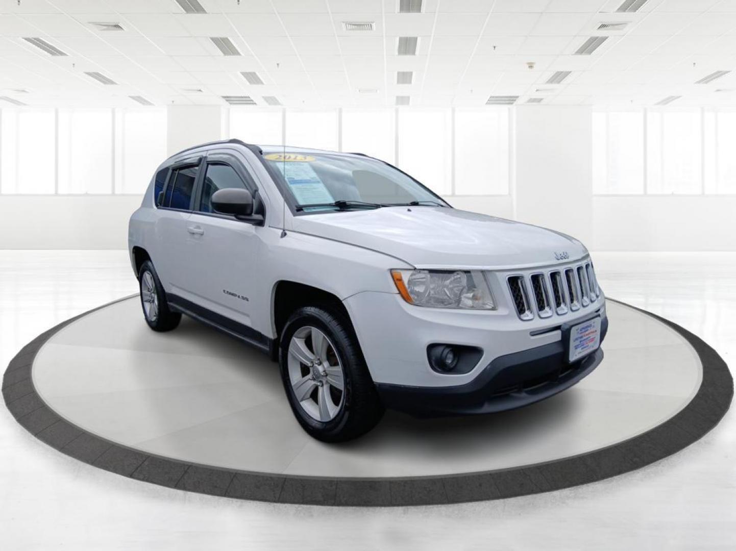 2013 Winter Chill Pearlcoat Jeep Compass Latitude 4WD (1C4NJDEB5DD) with an 2.4L L4 DOHC 16V engine, Continuously Variable Transmission transmission, located at 880 E. National Road, Vandalia, OH, 45377, (937) 908-9800, 39.891918, -84.183594 - Photo#0