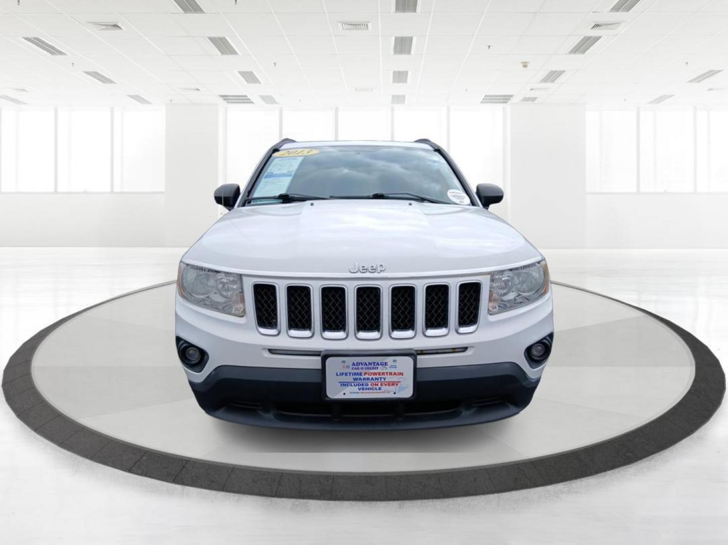 2013 Winter Chill Pearlcoat Jeep Compass Latitude 4WD (1C4NJDEB5DD) with an 2.4L L4 DOHC 16V engine, Continuously Variable Transmission transmission, located at 880 E. National Road, Vandalia, OH, 45377, (937) 908-9800, 39.891918, -84.183594 - Photo#6