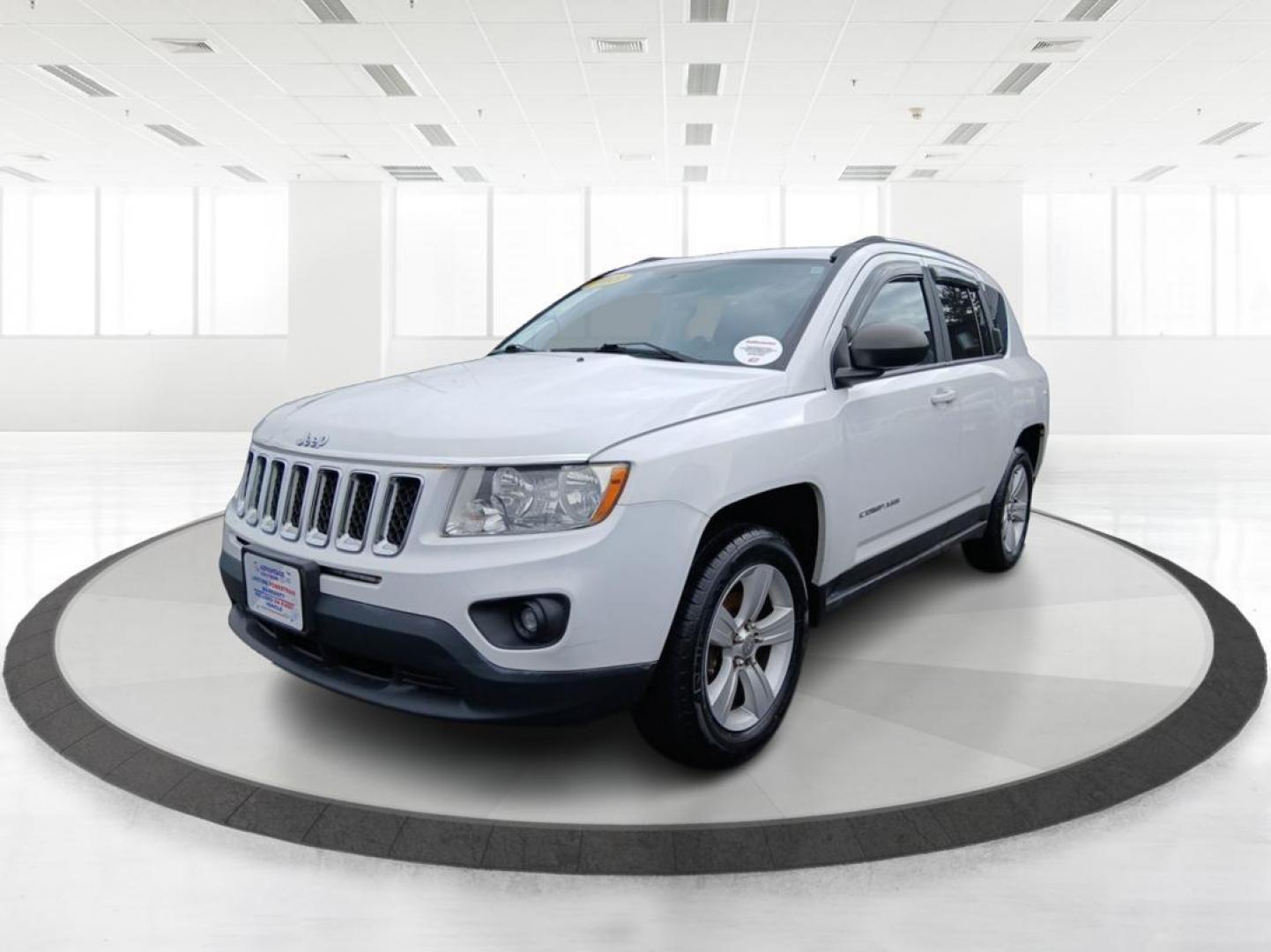 2013 Winter Chill Pearlcoat Jeep Compass Latitude 4WD (1C4NJDEB5DD) with an 2.4L L4 DOHC 16V engine, Continuously Variable Transmission transmission, located at 880 E. National Road, Vandalia, OH, 45377, (937) 908-9800, 39.891918, -84.183594 - Photo#7