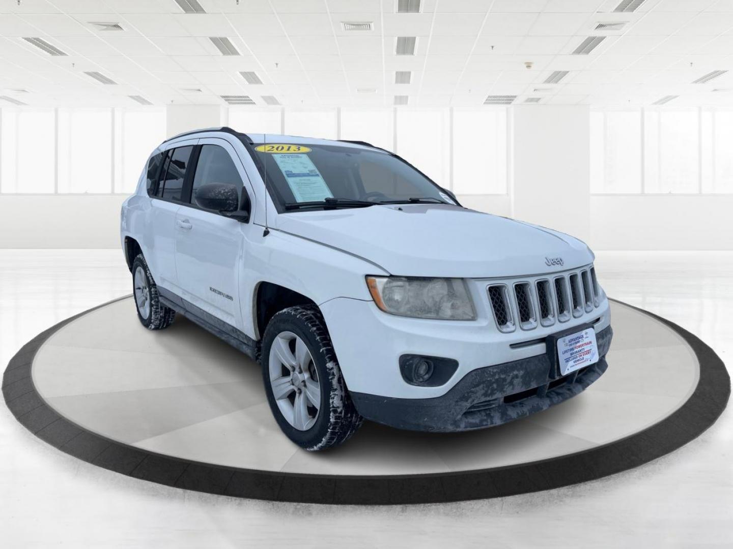 2013 Jeep Compass Latitude (1C4NJDEB3DD) with an Other engine, located at 1230 East Main St, Xenia, OH, 45385, (937) 908-9800, 39.688026, -83.910172 - 2013 Jeep Compass Latitude - Photo#0