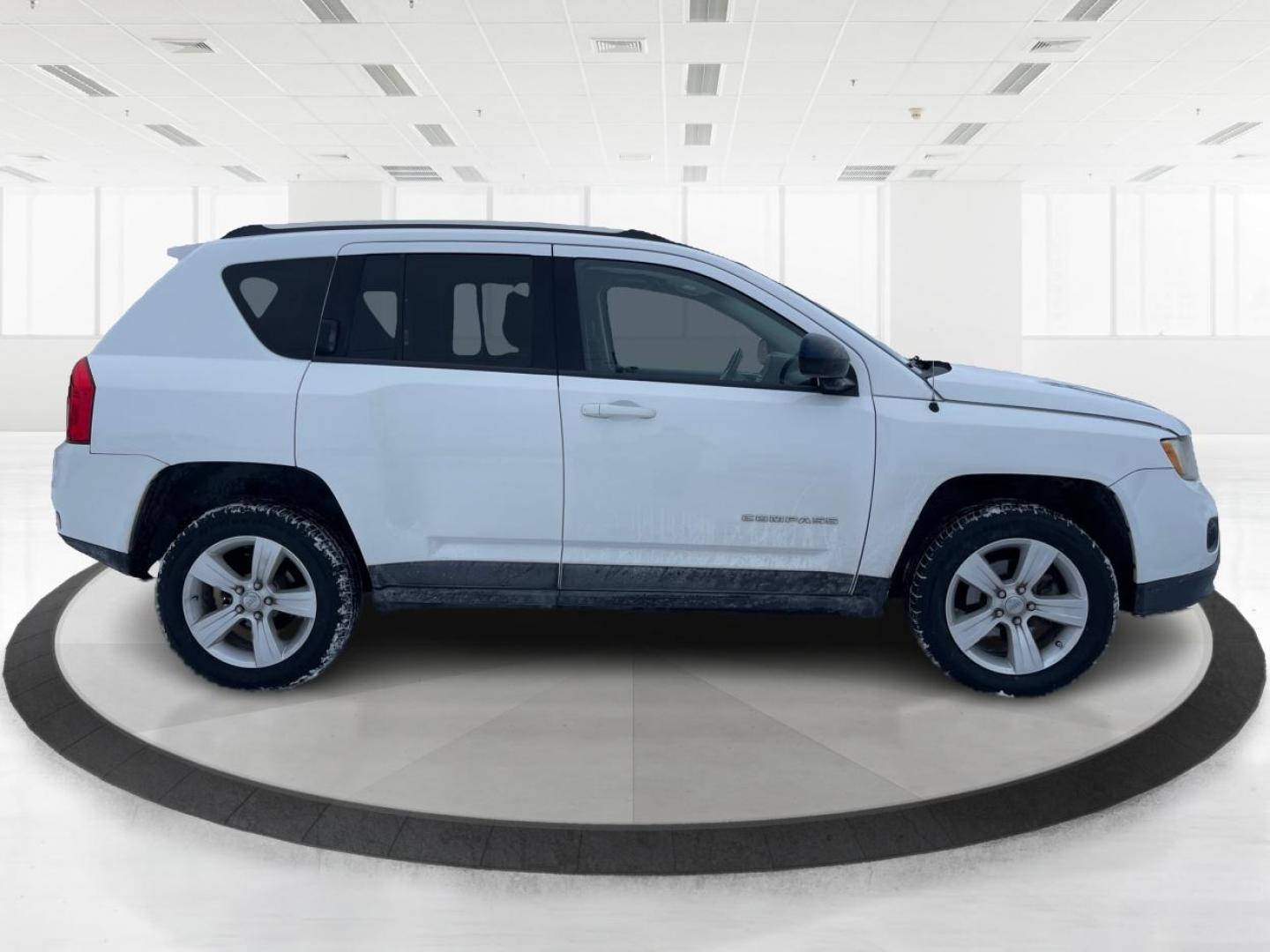 2013 Jeep Compass Latitude (1C4NJDEB3DD) with an Other engine, located at 1230 East Main St, Xenia, OH, 45385, (937) 908-9800, 39.688026, -83.910172 - 2013 Jeep Compass Latitude - Photo#1