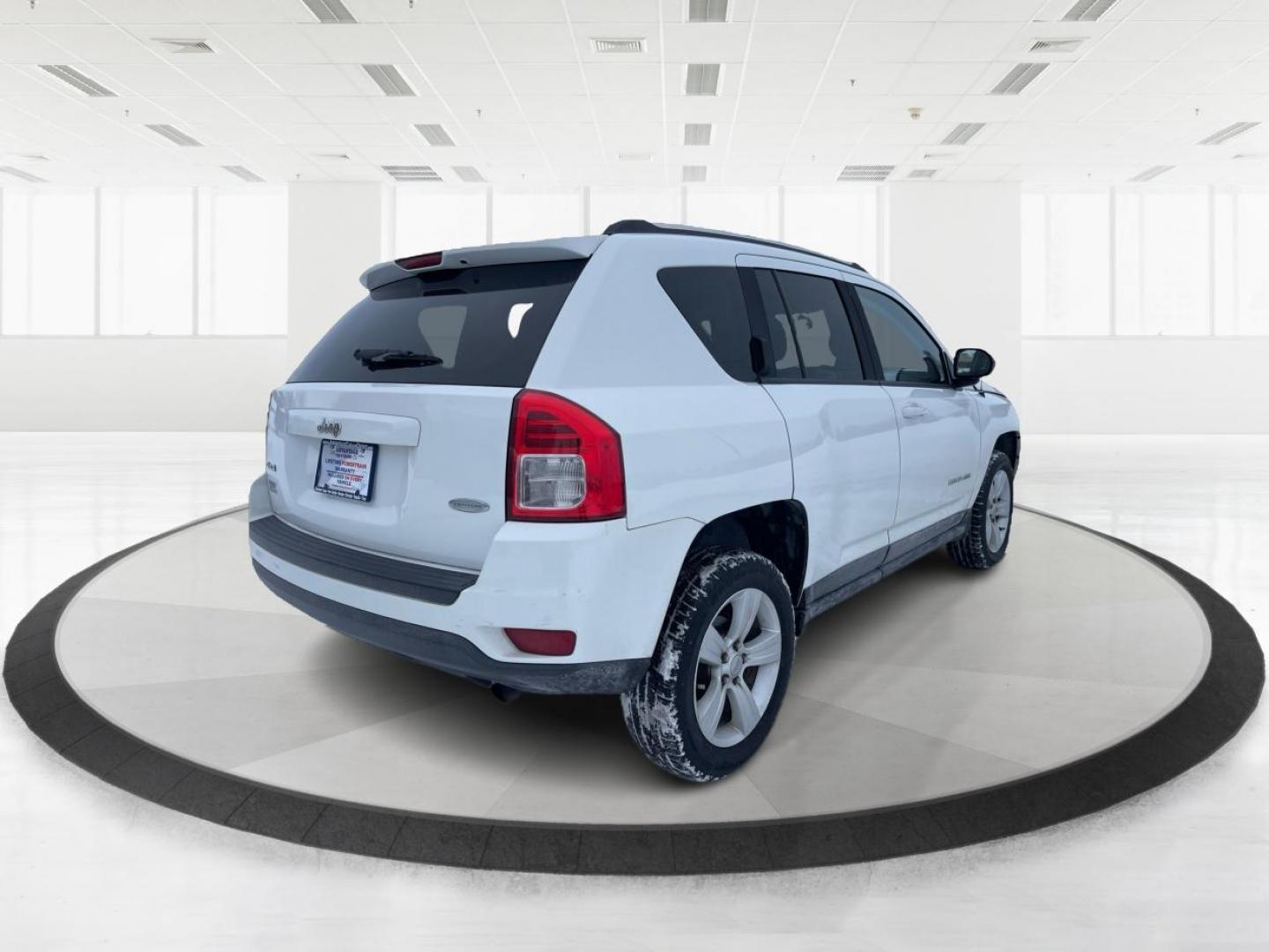 2013 Jeep Compass Latitude (1C4NJDEB3DD) with an Other engine, located at 1230 East Main St, Xenia, OH, 45385, (937) 908-9800, 39.688026, -83.910172 - 2013 Jeep Compass Latitude - Photo#2