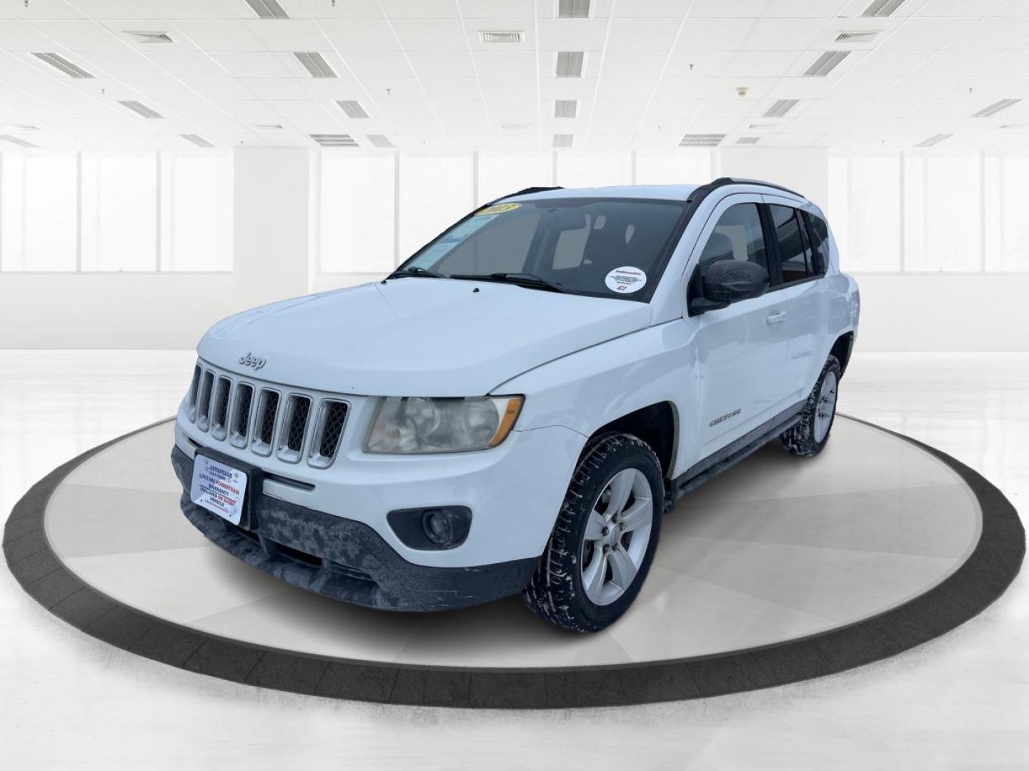 2013 Jeep Compass Latitude (1C4NJDEB3DD) with an Other engine, located at 1230 East Main St, Xenia, OH, 45385, (937) 908-9800, 39.688026, -83.910172 - 2013 Jeep Compass Latitude - Photo#7