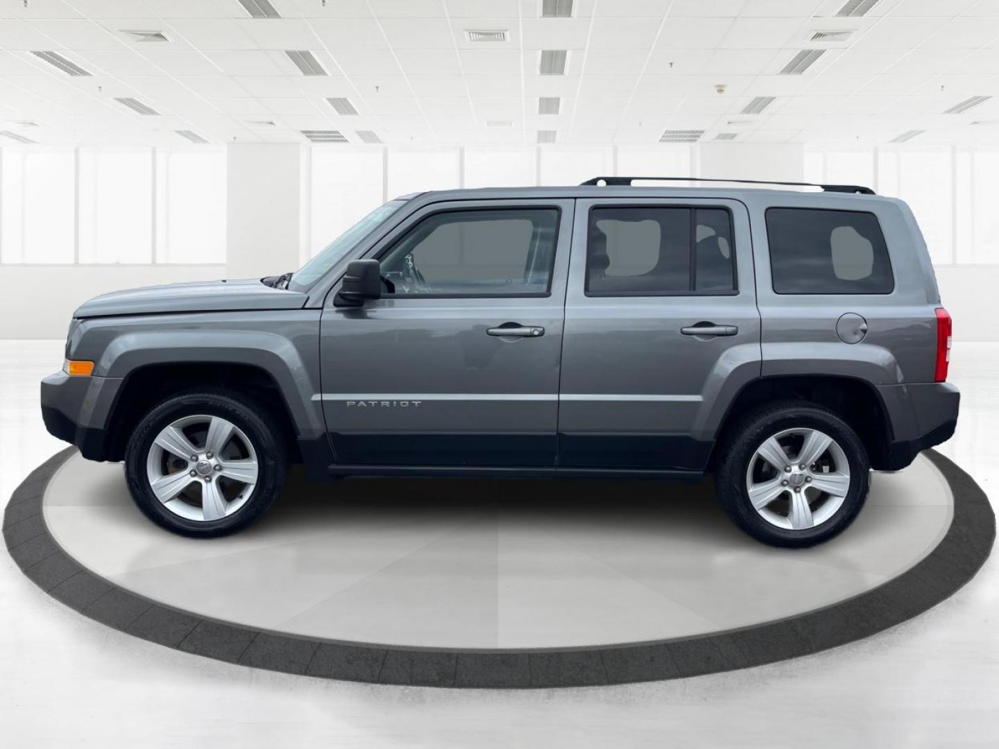 2013 Mineral Gray Metallic Jeep Patriot Latitude 4WD (1C4NJRFB5DD) with an 2.4L L4 DOHC 16V engine, located at 1951 S Dayton Lakeview Rd., New Carlisle, OH, 45344, (937) 908-9800, 39.890999, -84.050255 - Photo#5