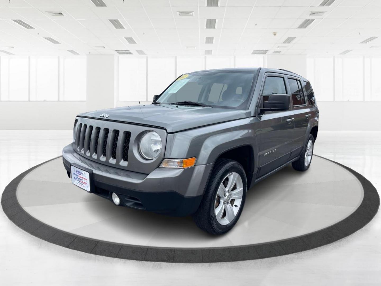 2013 Mineral Gray Metallic Jeep Patriot Latitude 4WD (1C4NJRFB5DD) with an 2.4L L4 DOHC 16V engine, located at 1951 S Dayton Lakeview Rd., New Carlisle, OH, 45344, (937) 908-9800, 39.890999, -84.050255 - Photo#7