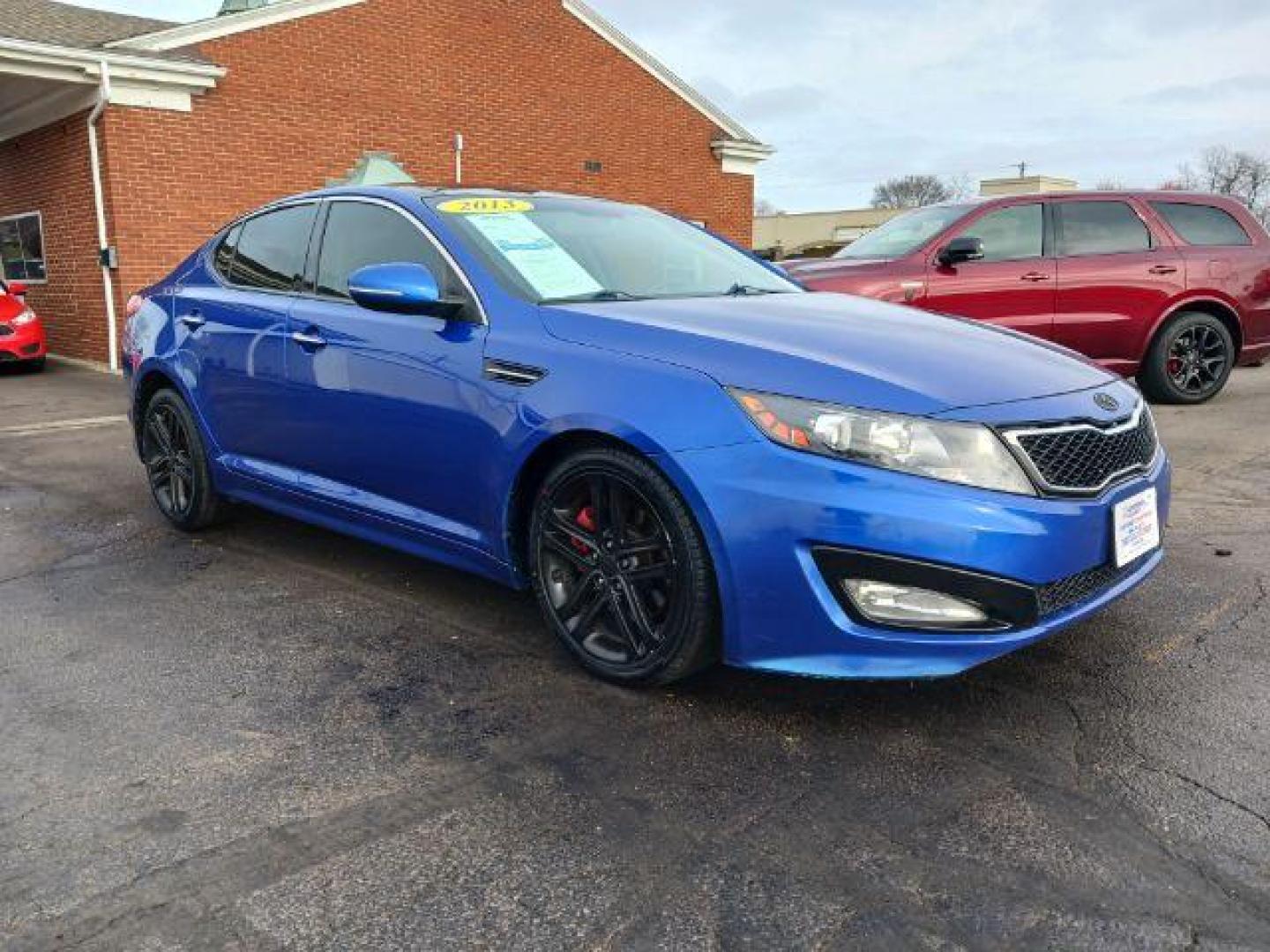 2013 Corsa Blue Pearl Metallic Kia Optima SX (5XXGR4A67DG) with an 2.0L L4 DOHC 16V TURBO engine, 6-Speed Automatic transmission, located at 1230 East Main St, Xenia, OH, 45385, (937) 908-9800, 39.688026, -83.910172 - Photo#0