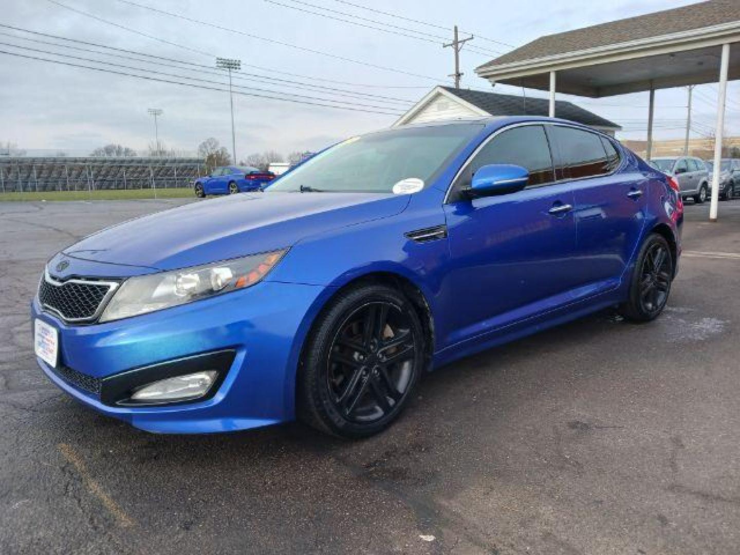 2013 Corsa Blue Pearl Metallic Kia Optima SX (5XXGR4A67DG) with an 2.0L L4 DOHC 16V TURBO engine, 6-Speed Automatic transmission, located at 1230 East Main St, Xenia, OH, 45385, (937) 908-9800, 39.688026, -83.910172 - Photo#2