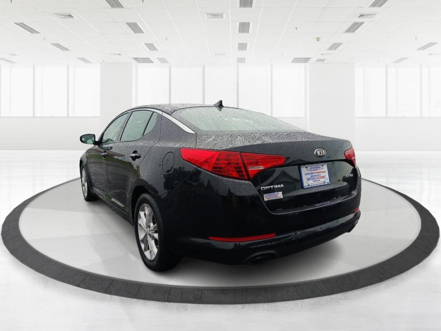 2013 Aurora Black Kia Optima (5XXGN4A7XDG) with an 2.4L L4 DOHC 16V engine, 6-Speed Automatic transmission, located at 880 E. National Road, Vandalia, OH, 45377, (937) 908-9800, 39.891918, -84.183594 - Photo#4