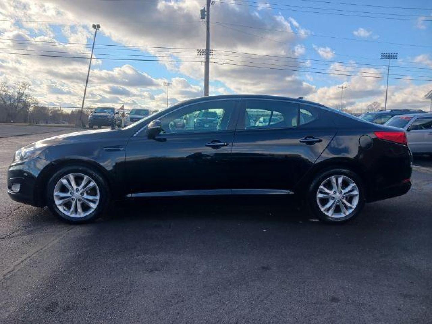 2013 Ebony Black Kia Optima LX AT (5XXGM4A73DG) with an 2.4L L4 DOHC 16V engine, 6-Speed Automatic transmission, located at 1230 East Main St, Xenia, OH, 45385, (937) 908-9800, 39.688026, -83.910172 - Photo#3