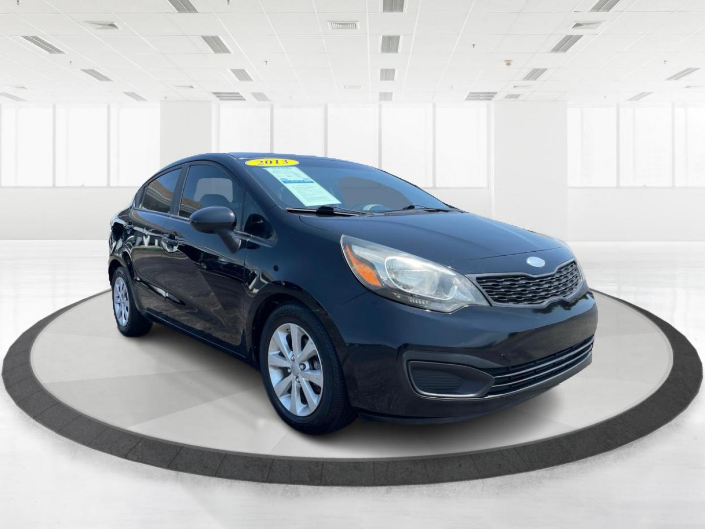 2013 Aurora Black Pearl Kia Rio LX (KNADM4A32D6) with an 1.6L L4 DOHC 16V engine, located at 1099 N County Rd 25A , Troy, OH, 45373, (937) 908-9800, 40.057079, -84.212883 - Photo#0