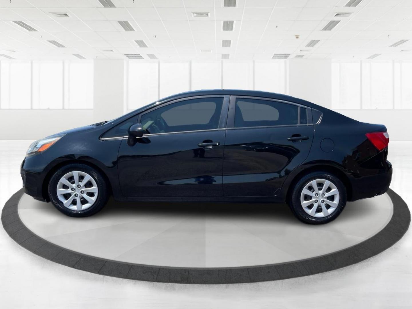 2013 Aurora Black Pearl Kia Rio LX (KNADM4A32D6) with an 1.6L L4 DOHC 16V engine, located at 1099 N County Rd 25A , Troy, OH, 45373, (937) 908-9800, 40.057079, -84.212883 - Photo#5