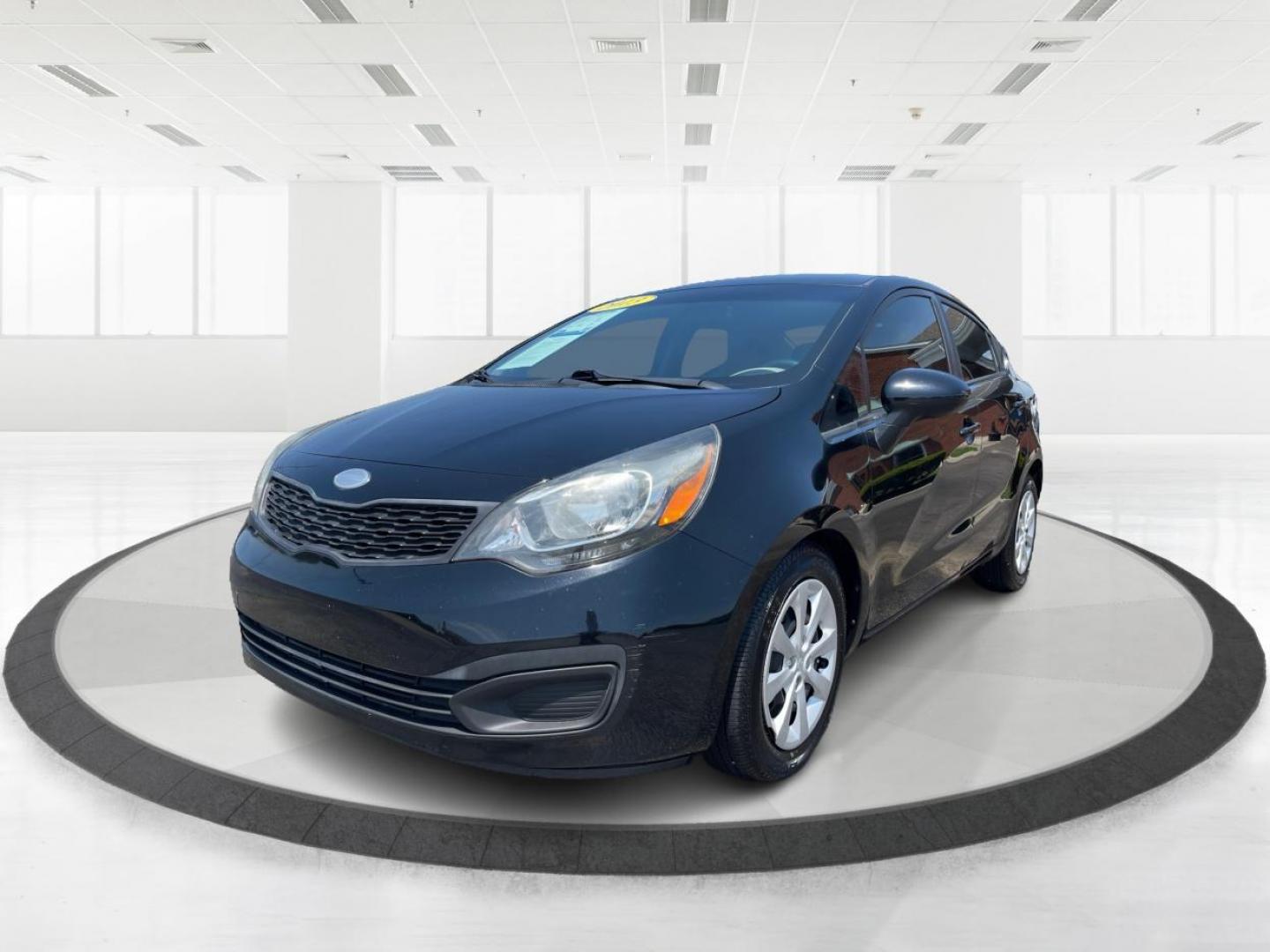 2013 Aurora Black Pearl Kia Rio LX (KNADM4A32D6) with an 1.6L L4 DOHC 16V engine, located at 1099 N County Rd 25A , Troy, OH, 45373, (937) 908-9800, 40.057079, -84.212883 - Photo#7