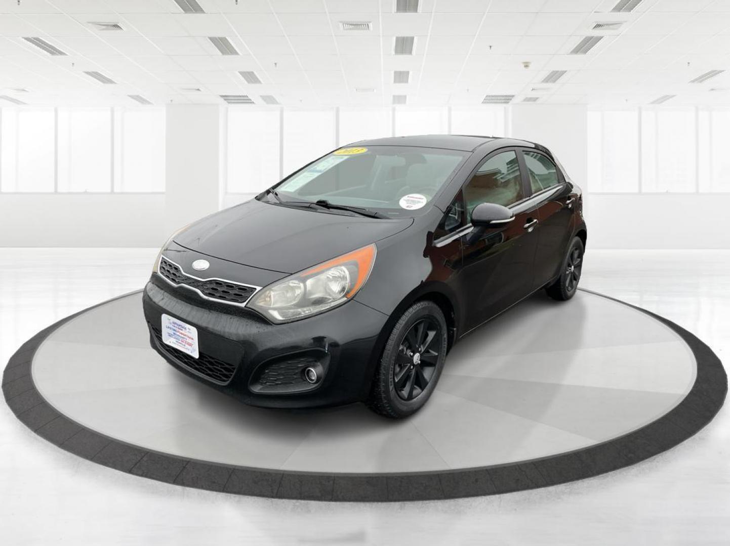 2013 Kia Rio EX (KNADN5A30D6) with an 1.6L I-4 gasoline direct injection engine, located at 880 E. National Road, Vandalia, OH, 45377, (937) 908-9800, 39.891918, -84.183594 - 2013 Kia Rio EX - Photo#7