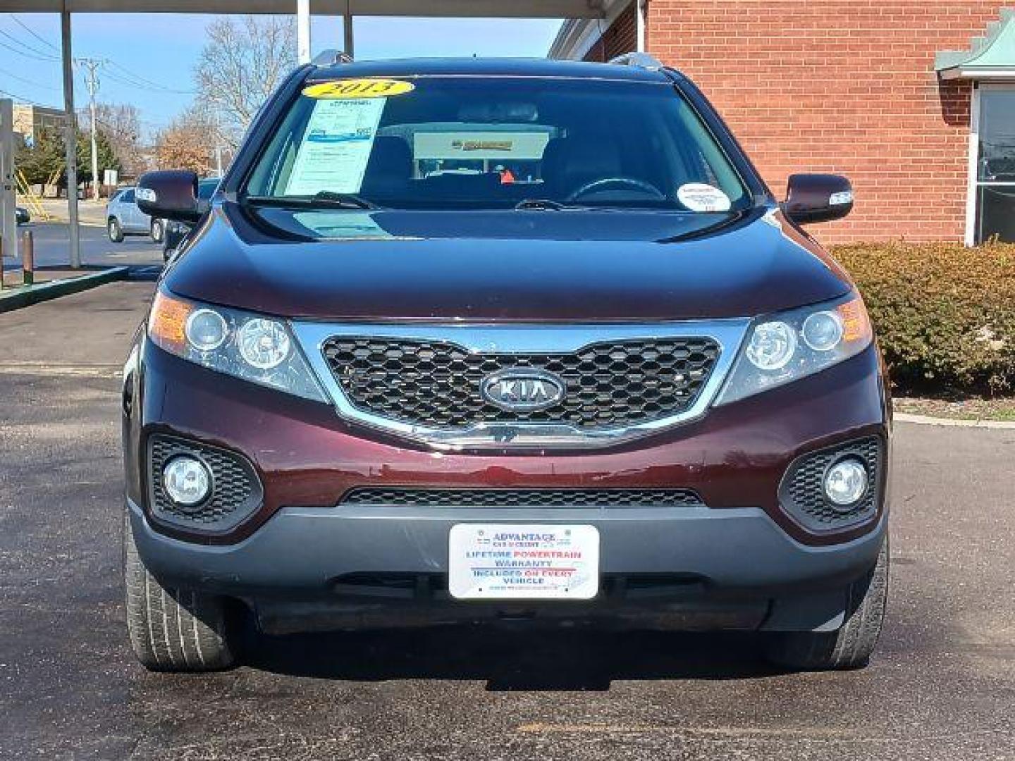 2013 Dark Cherry Kia Sorento EX 4WD (5XYKUCA67DG) with an 2.4L L4 DOHC 16V engine, 6-Speed Automatic transmission, located at 1184 Kauffman Ave, Fairborn, OH, 45324, (937) 908-9800, 39.807072, -84.030914 - Photo#1