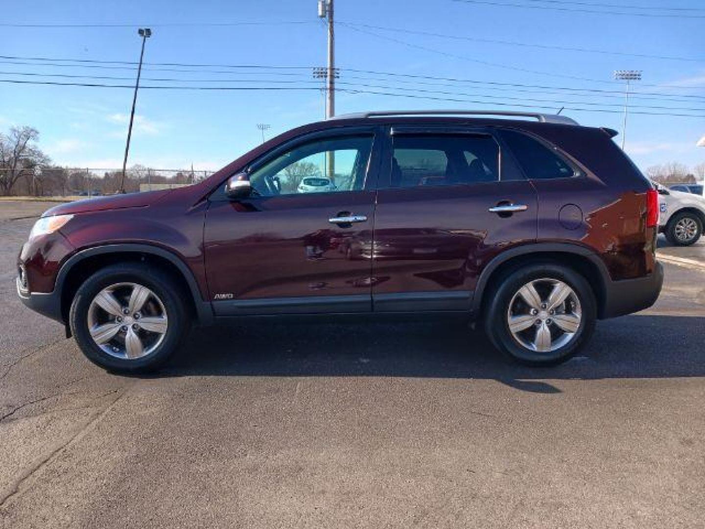 2013 Dark Cherry Kia Sorento EX 4WD (5XYKUCA67DG) with an 2.4L L4 DOHC 16V engine, 6-Speed Automatic transmission, located at 1184 Kauffman Ave, Fairborn, OH, 45324, (937) 908-9800, 39.807072, -84.030914 - Photo#3