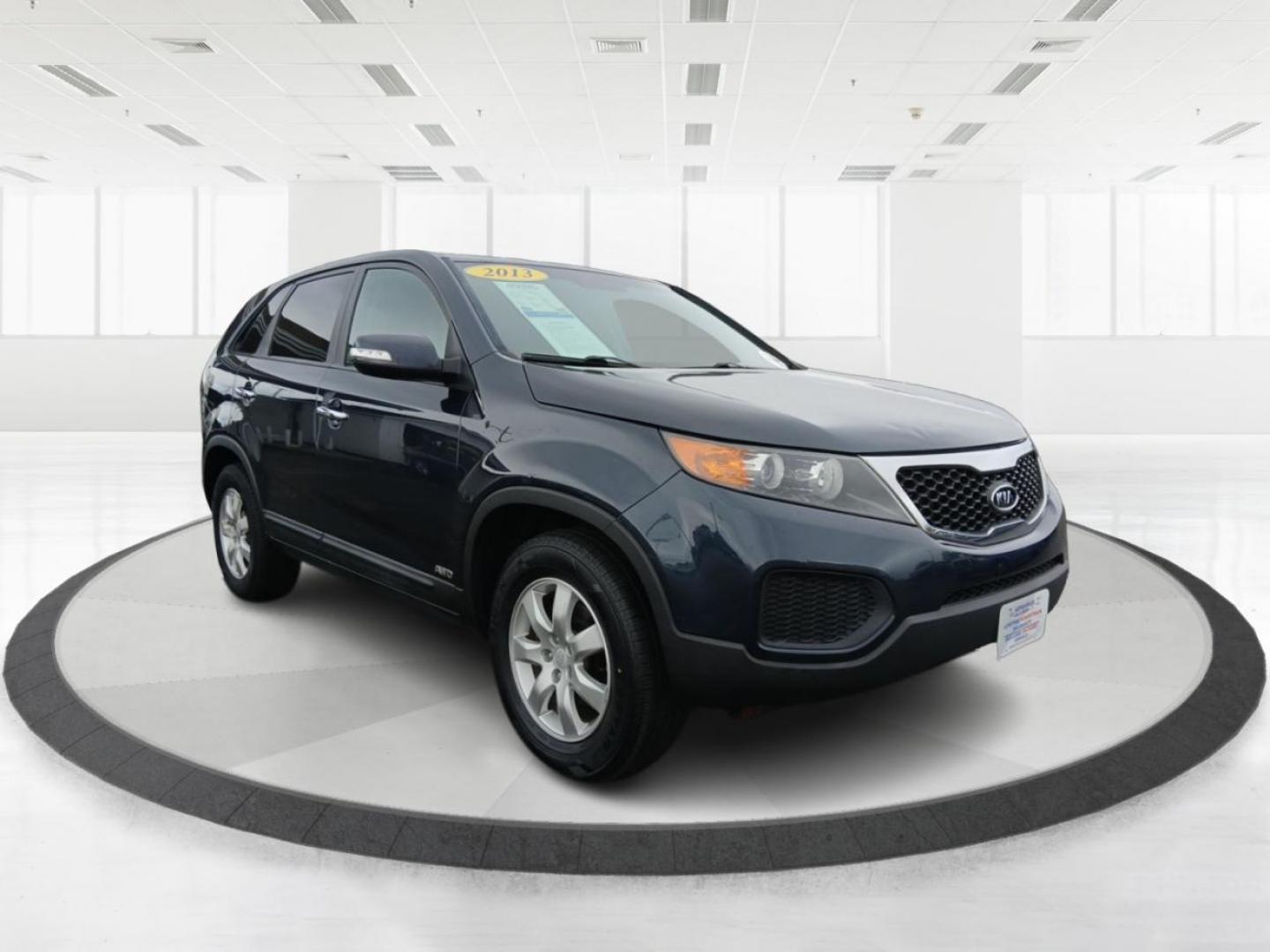 2013 Baltic Blue Kia Sorento LX 4WD (5XYKTCA69DG) with an 2.4L L4 DOHC 16V engine, 6-Speed Automatic transmission, located at 1099 N County Rd 25A , Troy, OH, 45373, (937) 908-9800, 40.057079, -84.212883 - Photo#0