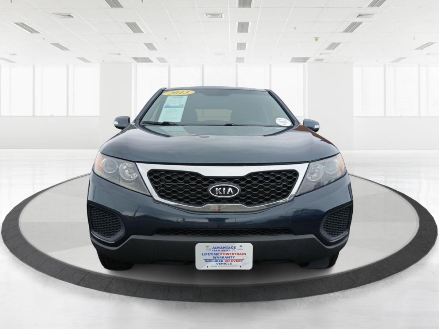 2013 Baltic Blue Kia Sorento LX 4WD (5XYKTCA69DG) with an 2.4L L4 DOHC 16V engine, 6-Speed Automatic transmission, located at 1099 N County Rd 25A , Troy, OH, 45373, (937) 908-9800, 40.057079, -84.212883 - Photo#6