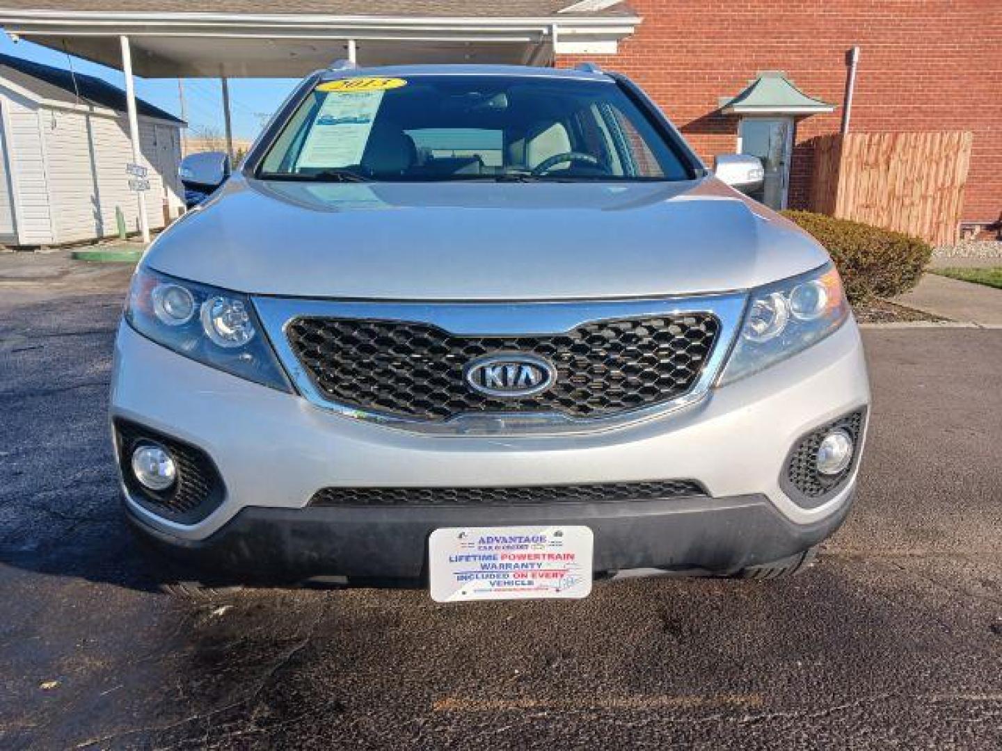 2013 Titanium Silver Kia Sorento LX 2WD (5XYKT3A66DG) with an 2.4L L4 DOHC 16V engine, 6-Speed Automatic transmission, located at 1099 N County Rd 25A , Troy, OH, 45373, (937) 908-9800, 40.057079, -84.212883 - Photo#1