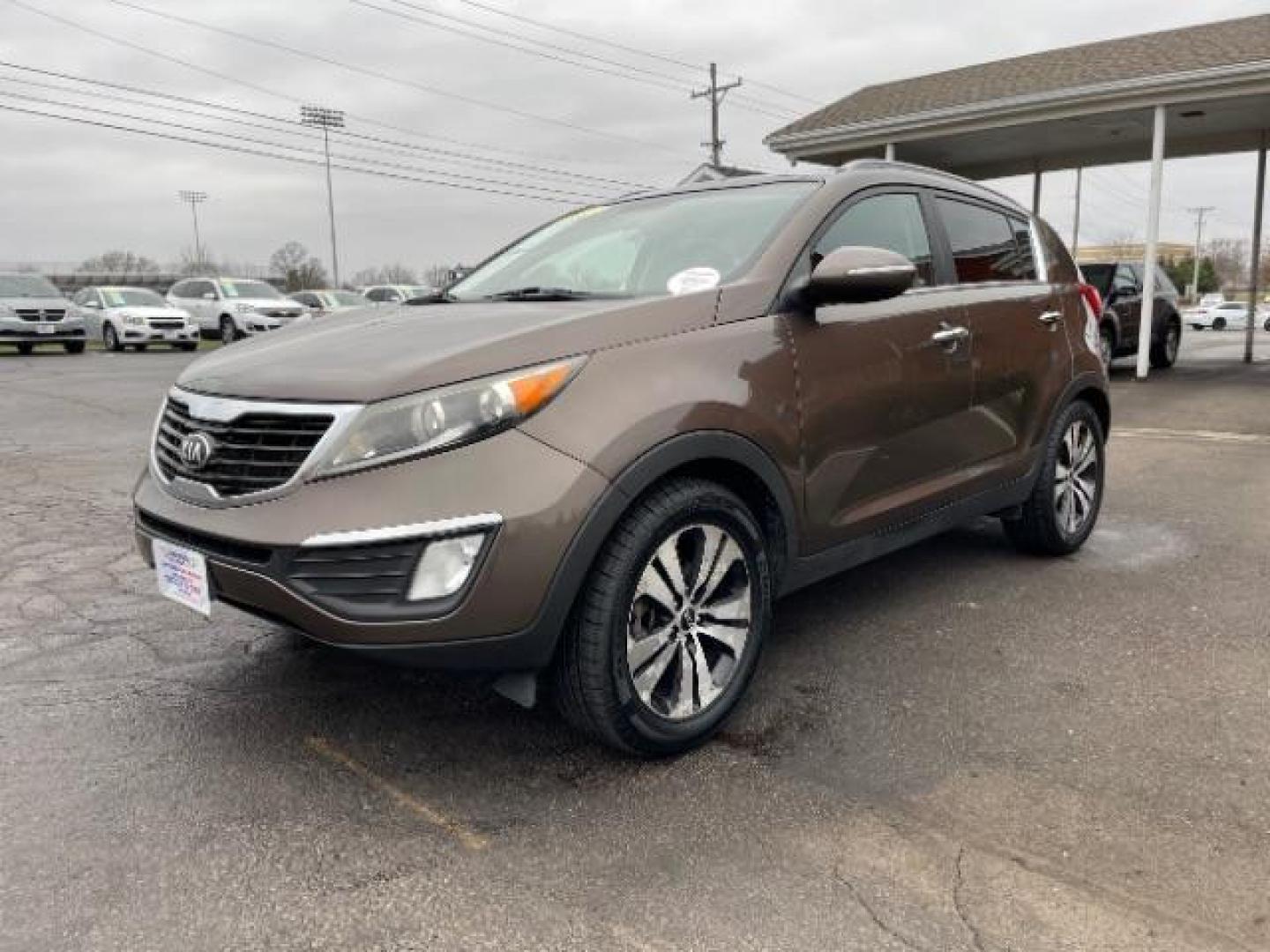 2013 Sand Track Kia Sportage EX FWD (KNDPC3A20D7) with an 2.4L V6 DOHC 24V engine, 6-Speed Automatic transmission, located at 1099 N County Rd 25A , Troy, OH, 45373, (937) 908-9800, 40.057079, -84.212883 - Photo#1