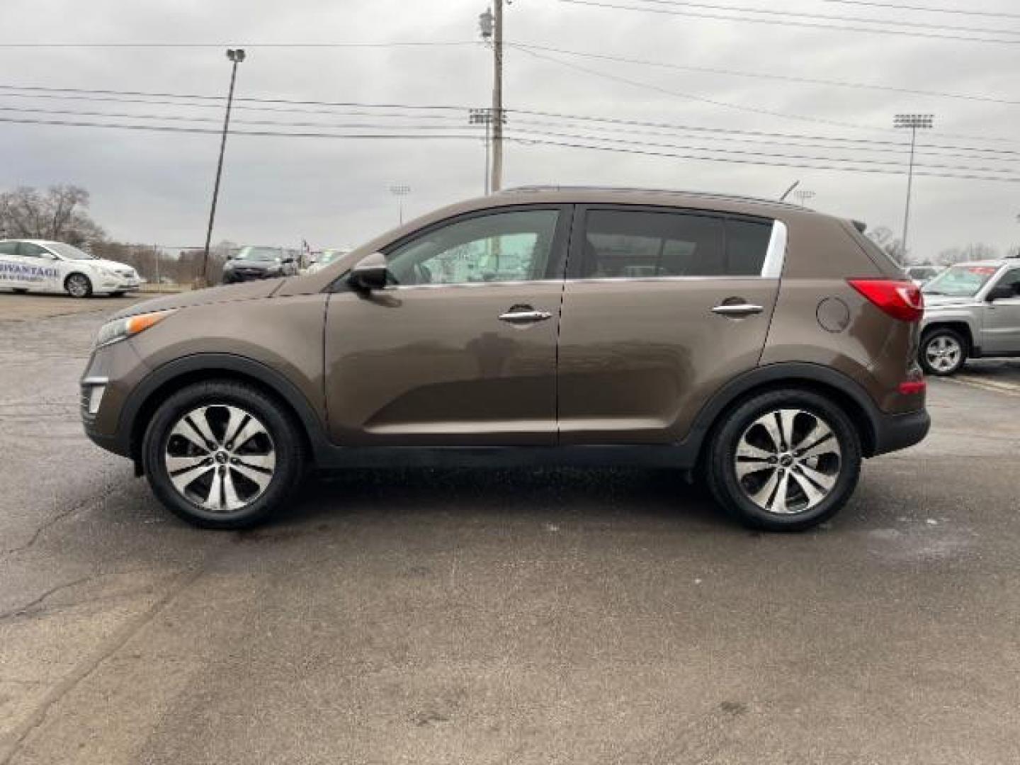 2013 Sand Track Kia Sportage EX FWD (KNDPC3A20D7) with an 2.4L V6 DOHC 24V engine, 6-Speed Automatic transmission, located at 1099 N County Rd 25A , Troy, OH, 45373, (937) 908-9800, 40.057079, -84.212883 - Photo#2