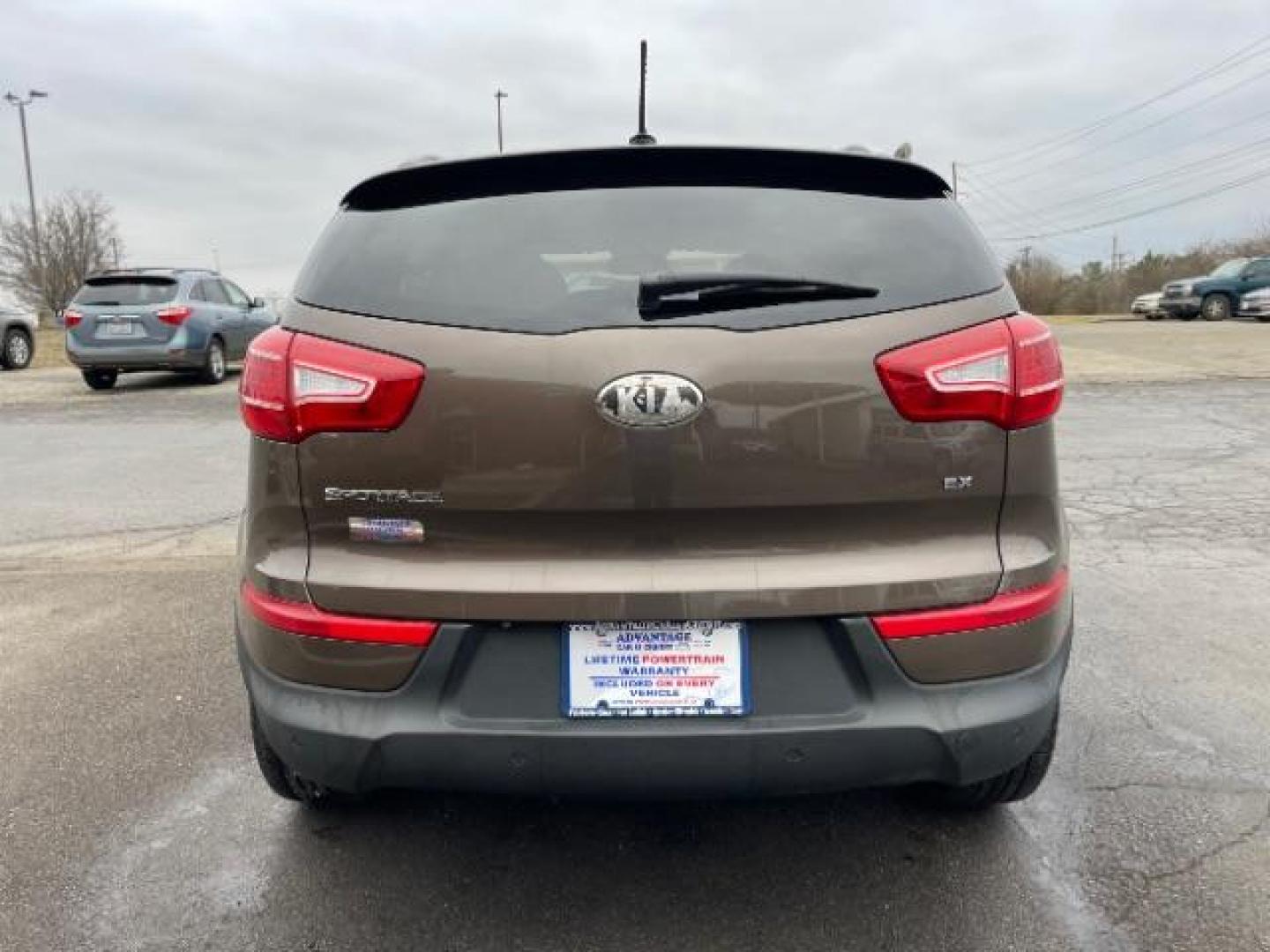 2013 Sand Track Kia Sportage EX FWD (KNDPC3A20D7) with an 2.4L V6 DOHC 24V engine, 6-Speed Automatic transmission, located at 1099 N County Rd 25A , Troy, OH, 45373, (937) 908-9800, 40.057079, -84.212883 - Photo#5