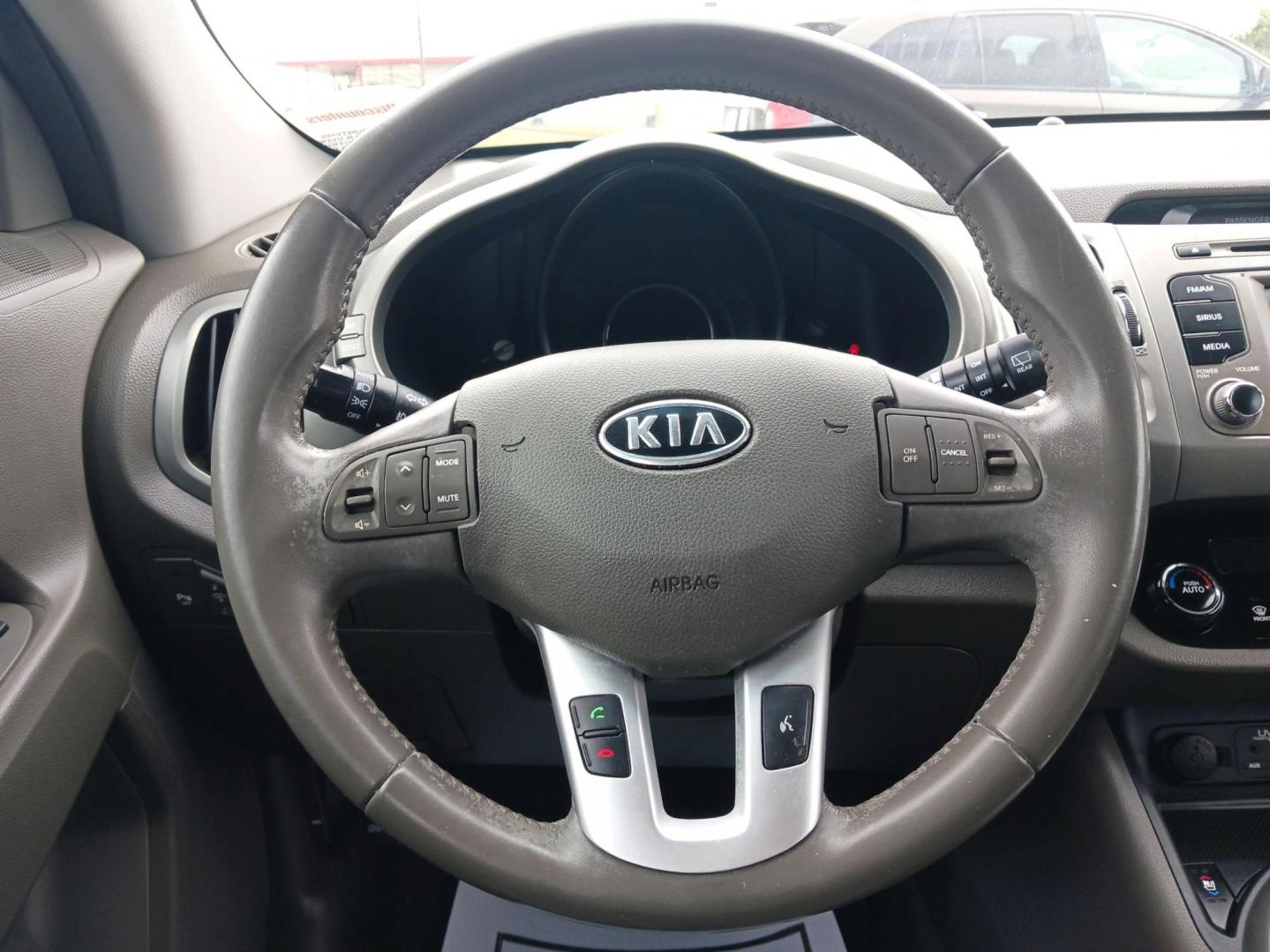 2013 Bright Silver Kia Sportage EX AWD (KNDPCCA2XD7) with an 2.4L V6 DOHC 24V engine, 6-Speed Automatic transmission, located at 1230 East Main St, Xenia, OH, 45385, (937) 908-9800, 39.688026, -83.910172 - Photo#15