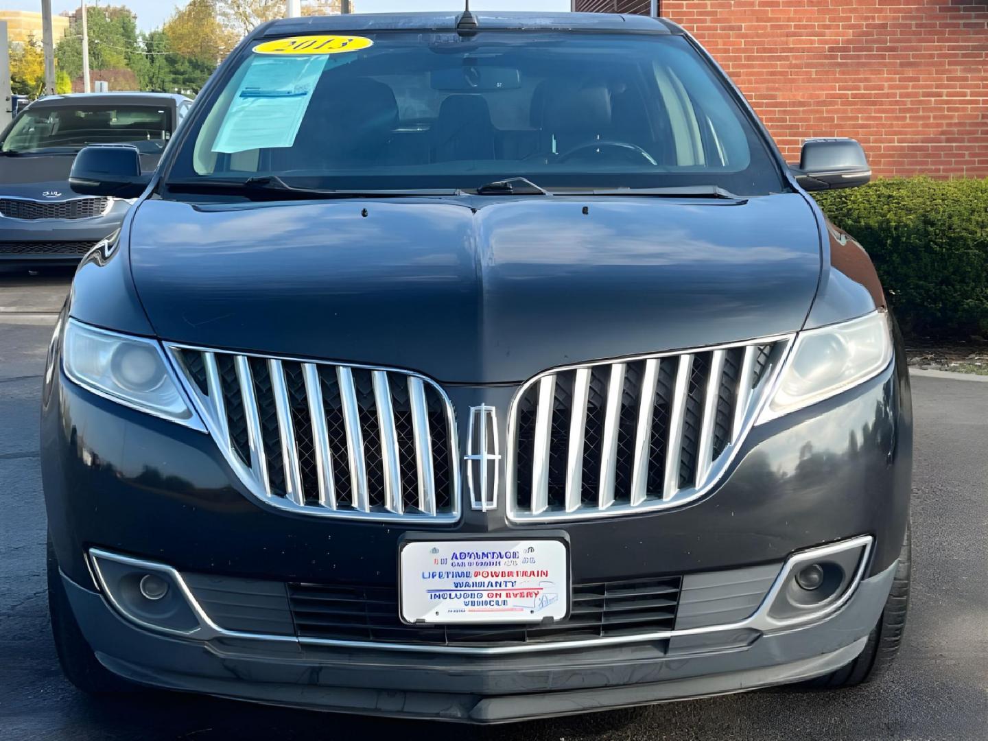 2013 Tuxedo Black Metallic Lincoln MKX AWD (2LMDJ8JK8DB) with an 3.7L V6 DOHC 24V engine, 6-Speed Automatic transmission, located at 401 Woodman Dr, Riverside, OH, 45431, (937) 908-9800, 39.760899, -84.123421 - Photo#5