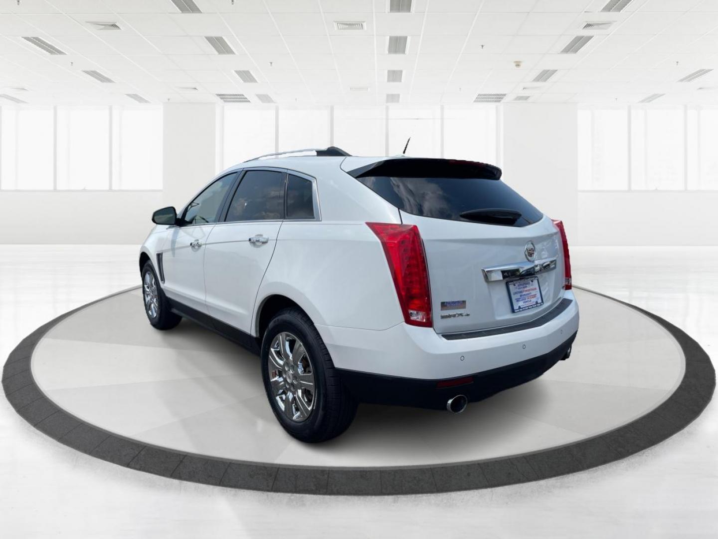 2014 Platinum Ice Tricoat Cadillac SRX (3GYFNEE33ES) with an 3.6L V6 DOHC 24V FFV engine, 6-Speed Automatic transmission, located at 401 Woodman Dr, Riverside, OH, 45431, (937) 908-9800, 39.760899, -84.123421 - Photo#4