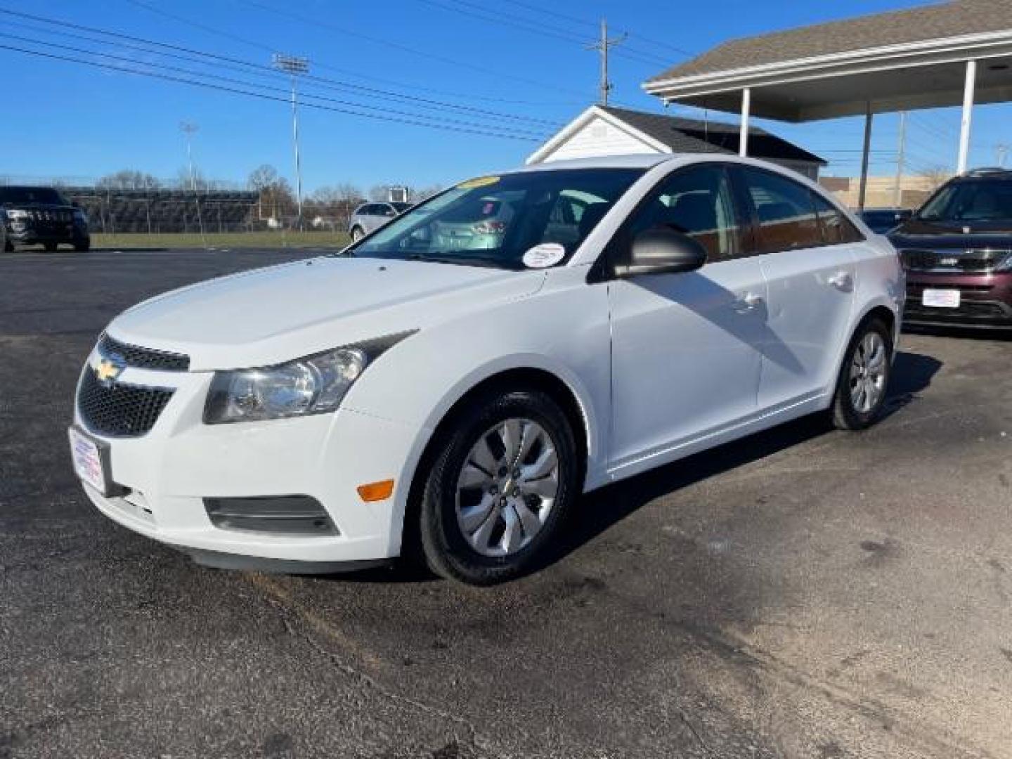 2014 Summit White Chevrolet Cruze LS Auto (1G1PA5SG7E7) with an 1.8L L4 DOHC 16V engine, 6-Speed Automatic transmission, located at 1099 N County Rd 25A , Troy, OH, 45373, (937) 908-9800, 40.057079, -84.212883 - Photo#1