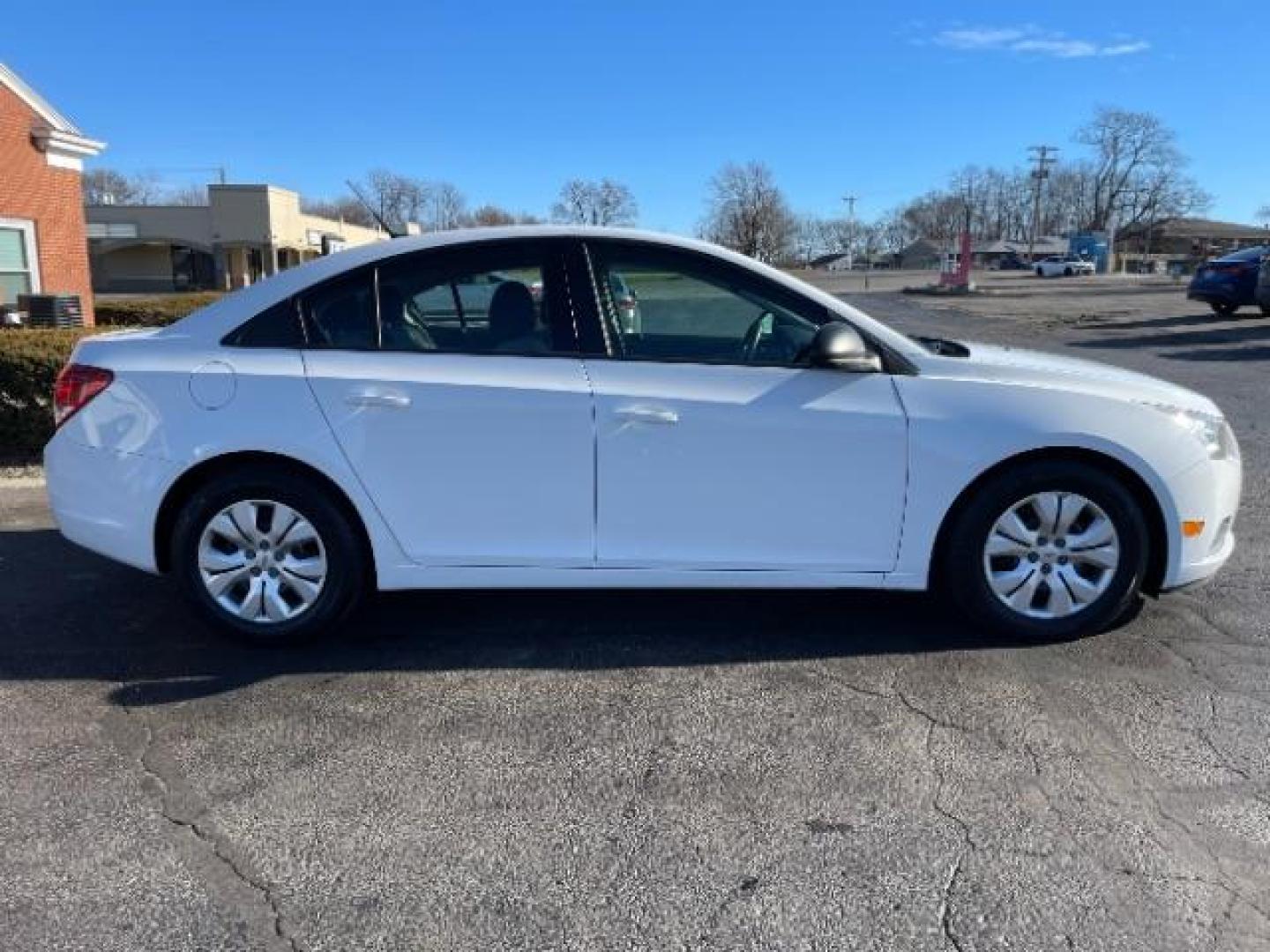 2014 Summit White Chevrolet Cruze LS Auto (1G1PA5SG7E7) with an 1.8L L4 DOHC 16V engine, 6-Speed Automatic transmission, located at 1099 N County Rd 25A , Troy, OH, 45373, (937) 908-9800, 40.057079, -84.212883 - Photo#3