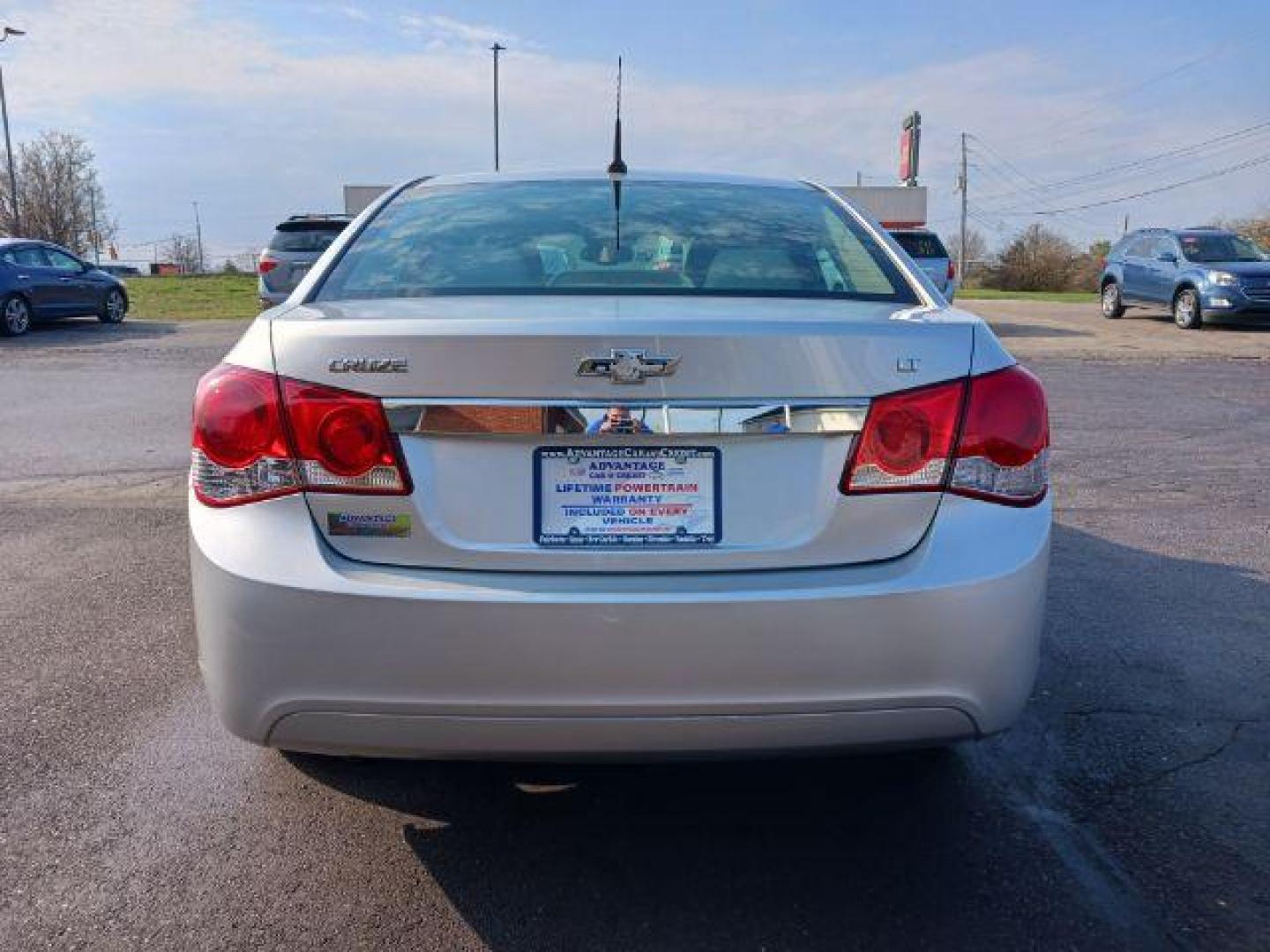 2014 Silver Ice Metallic Chevrolet Cruze 1LT Auto (1G1PC5SB0E7) with an 1.4L L4 DOHC 16V TURBO engine, 6-Speed Automatic transmission, located at 401 Woodman Dr, Riverside, OH, 45431, (937) 908-9800, 39.760899, -84.123421 - Photo#5