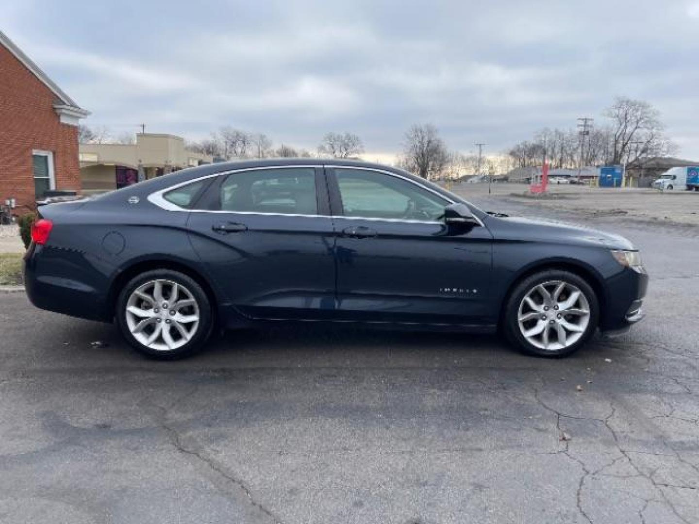 2014 Blue Topaz Metallic Chevrolet Impala 2LT (2G1125S33E9) with an 3.6L V6 DOHC 24VV FFV engine, 6-Speed Automatic transmission, located at 401 Woodman Dr, Riverside, OH, 45431, (937) 908-9800, 39.760899, -84.123421 - Photo#3