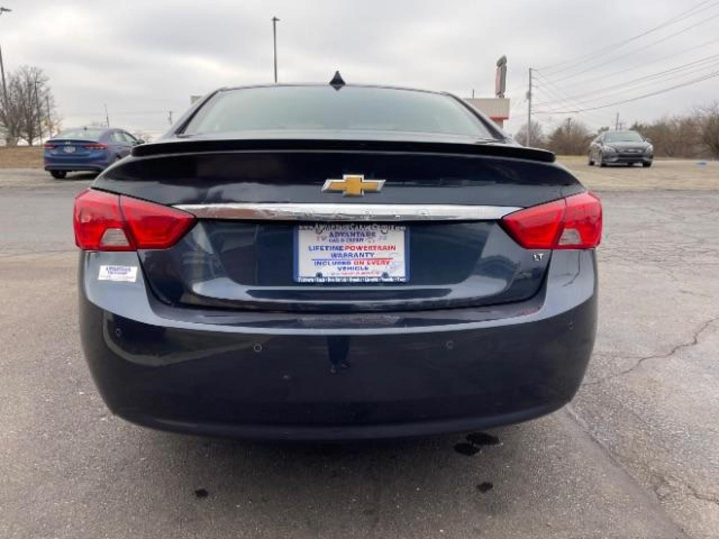 2014 Blue Topaz Metallic Chevrolet Impala 2LT (2G1125S33E9) with an 3.6L V6 DOHC 24VV FFV engine, 6-Speed Automatic transmission, located at 401 Woodman Dr, Riverside, OH, 45431, (937) 908-9800, 39.760899, -84.123421 - Photo#5