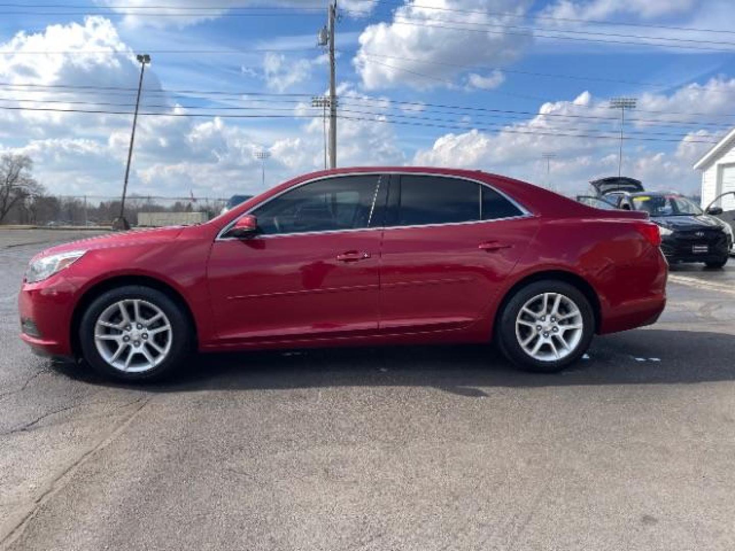 2014 Butte Red Metallic Chevrolet Malibu 1LT (1G11C5SL7EF) with an 2.5L L4 DOHC 16V engine, 6-Speed Automatic transmission, located at 401 Woodman Dr, Riverside, OH, 45431, (937) 908-9800, 39.760899, -84.123421 - Photo#2