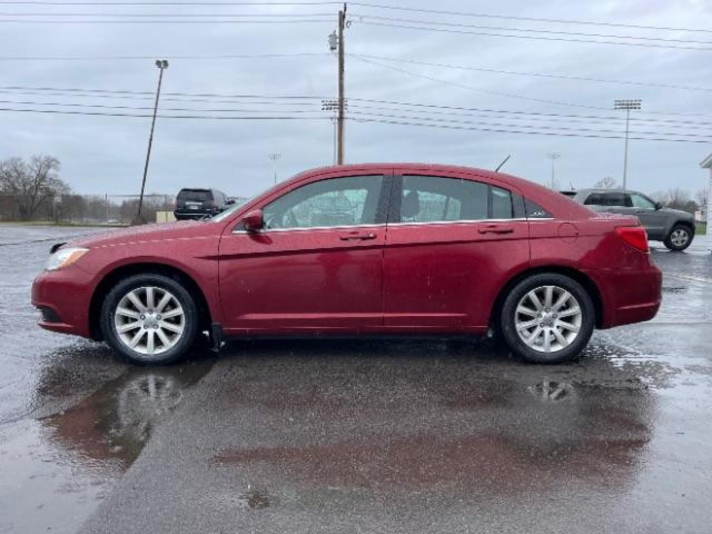 2014 Dp Cherry Red Crystal PC Chrysler 200 Touring (1C3CCBBG0EN) with an 3.6L V6 DOHC 24V FFV engine, 6-Speed Automatic transmission, located at 401 Woodman Dr, Riverside, OH, 45431, (937) 908-9800, 39.760899, -84.123421 - Photo#5