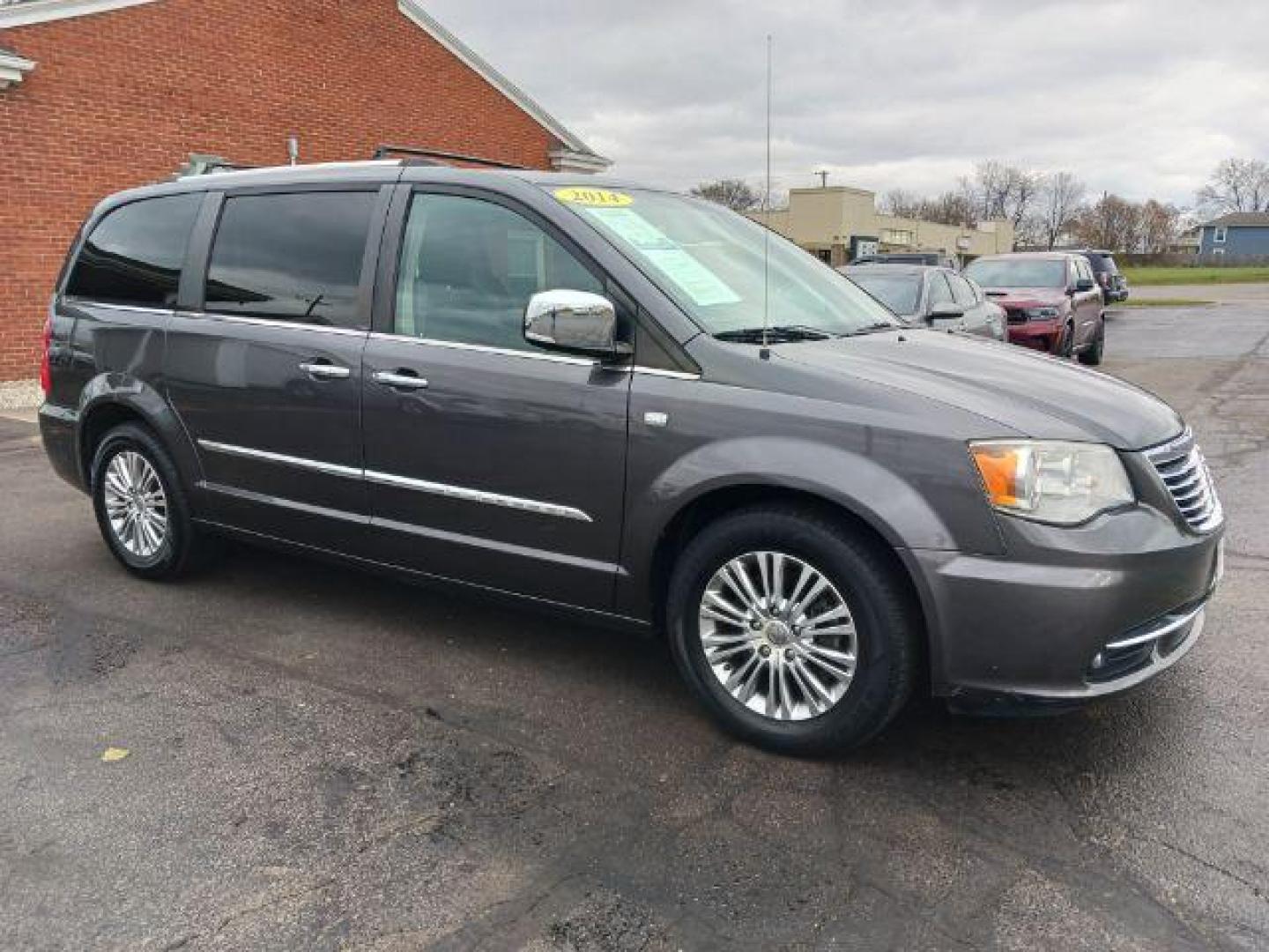 2014 Granite Crystal Met CC Chrysler Town and Country Touring-L (2C4RC1CG8ER) with an 3.6L V6 DOHC 24V engine, 6-Speed Automatic transmission, located at 401 Woodman Dr, Riverside, OH, 45431, (937) 908-9800, 39.760899, -84.123421 - Photo#0