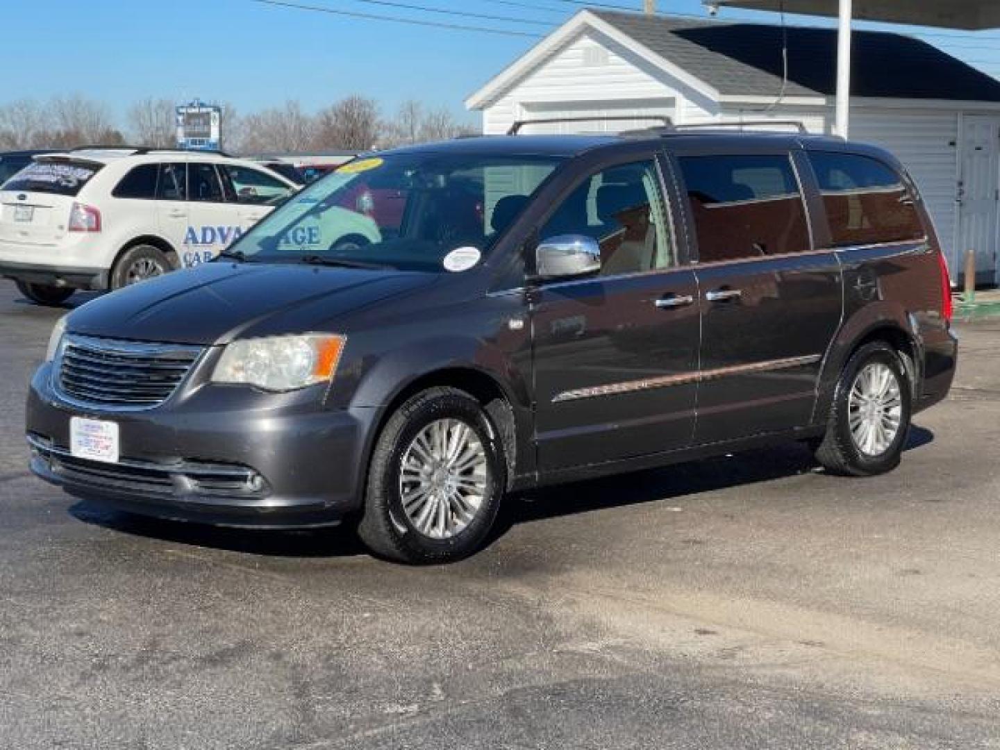 2014 Maximum Steel Metallic CC Chrysler Town and Country Touring-L (2C4RC1CG4ER) with an 3.6L V6 DOHC 24V engine, 6-Speed Automatic transmission, located at 1099 N County Rd 25A , Troy, OH, 45373, (937) 908-9800, 40.057079, -84.212883 - Photo#1