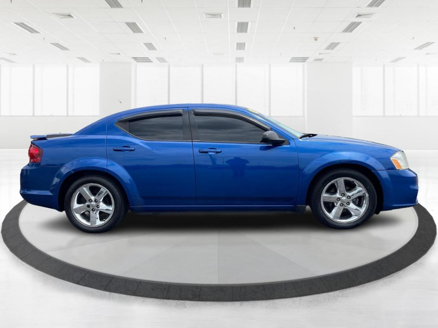 2014 Blue Streak Pearlcoat Dodge Avenger SE (1C3CDZAG1EN) with an 3.6L V6 DOHC 24V FFV engine, 6-Speed Automatic transmission, located at 1099 N County Rd 25A , Troy, OH, 45373, (937) 908-9800, 40.057079, -84.212883 - Photo#1