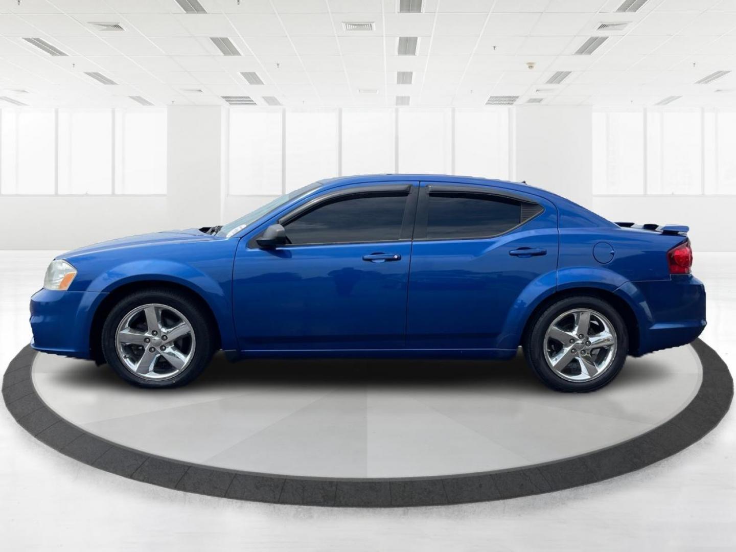 2014 Blue Streak Pearlcoat Dodge Avenger SE (1C3CDZAG1EN) with an 3.6L V6 DOHC 24V FFV engine, 6-Speed Automatic transmission, located at 1099 N County Rd 25A , Troy, OH, 45373, (937) 908-9800, 40.057079, -84.212883 - Photo#5