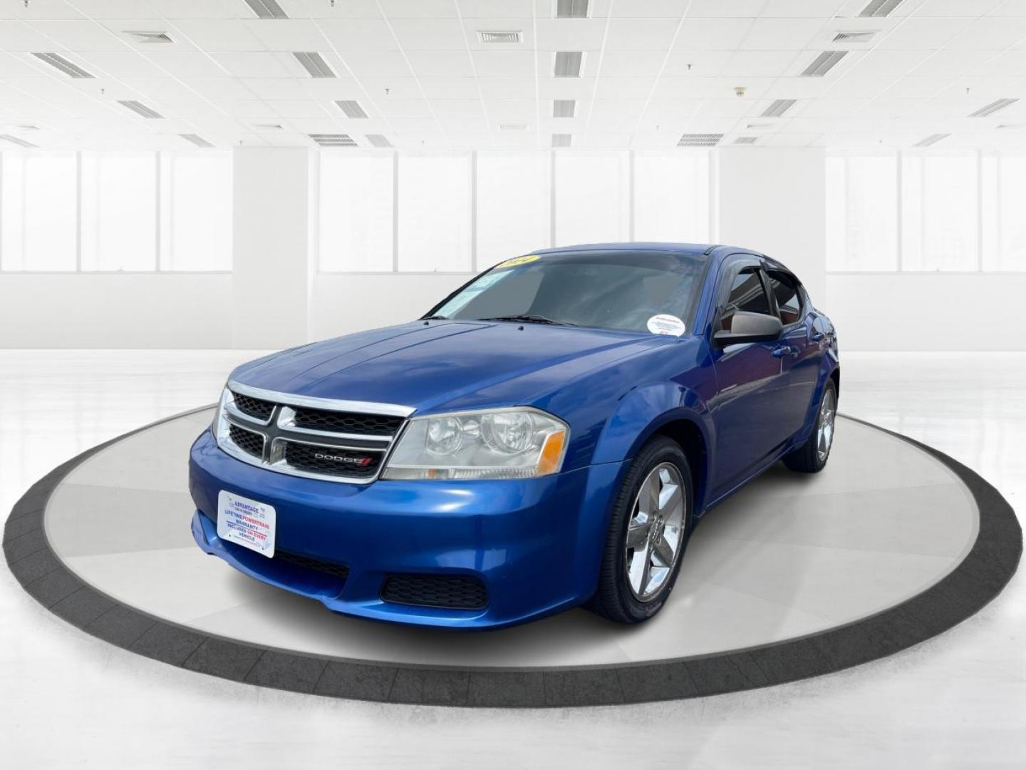 2014 Blue Streak Pearlcoat Dodge Avenger SE (1C3CDZAG1EN) with an 3.6L V6 DOHC 24V FFV engine, 6-Speed Automatic transmission, located at 1099 N County Rd 25A , Troy, OH, 45373, (937) 908-9800, 40.057079, -84.212883 - Photo#7