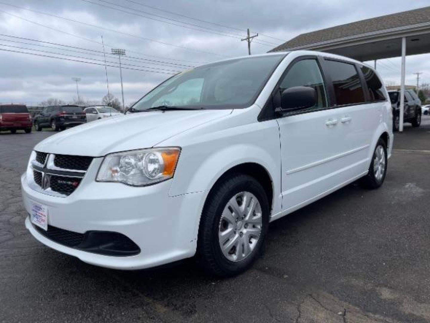 2014 Bright White Clearcoat Dodge Grand Caravan SE (2C4RDGBG9ER) with an 3.6L V6 DOHC 24V engine, 6-Speed Automatic transmission, located at 4508 South Dixie Dr, Moraine, OH, 45439, (937) 908-9800, 39.689976, -84.218452 - Photo#1