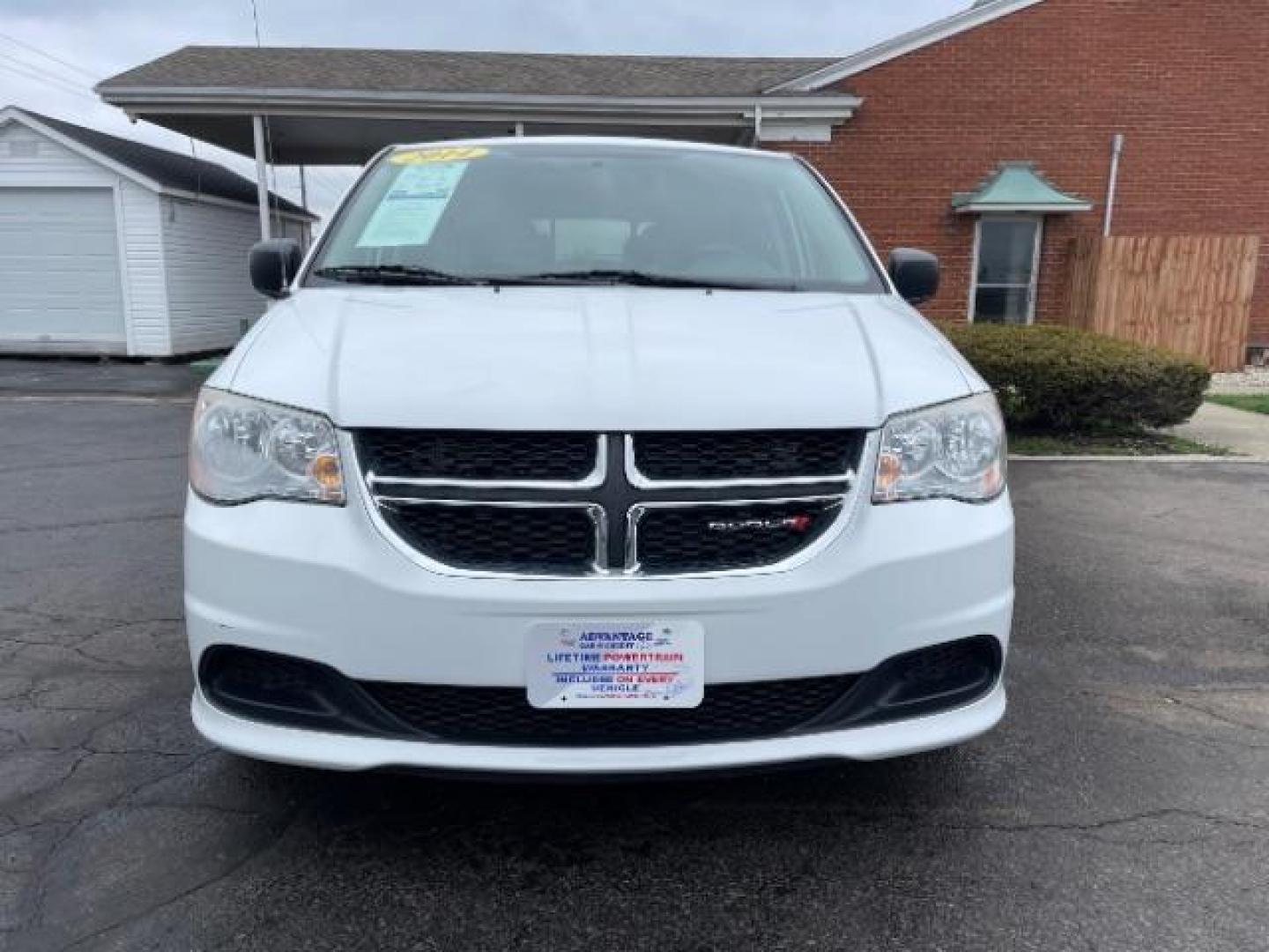 2014 Bright White Clearcoat Dodge Grand Caravan SE (2C4RDGBG9ER) with an 3.6L V6 DOHC 24V engine, 6-Speed Automatic transmission, located at 4508 South Dixie Dr, Moraine, OH, 45439, (937) 908-9800, 39.689976, -84.218452 - Photo#2