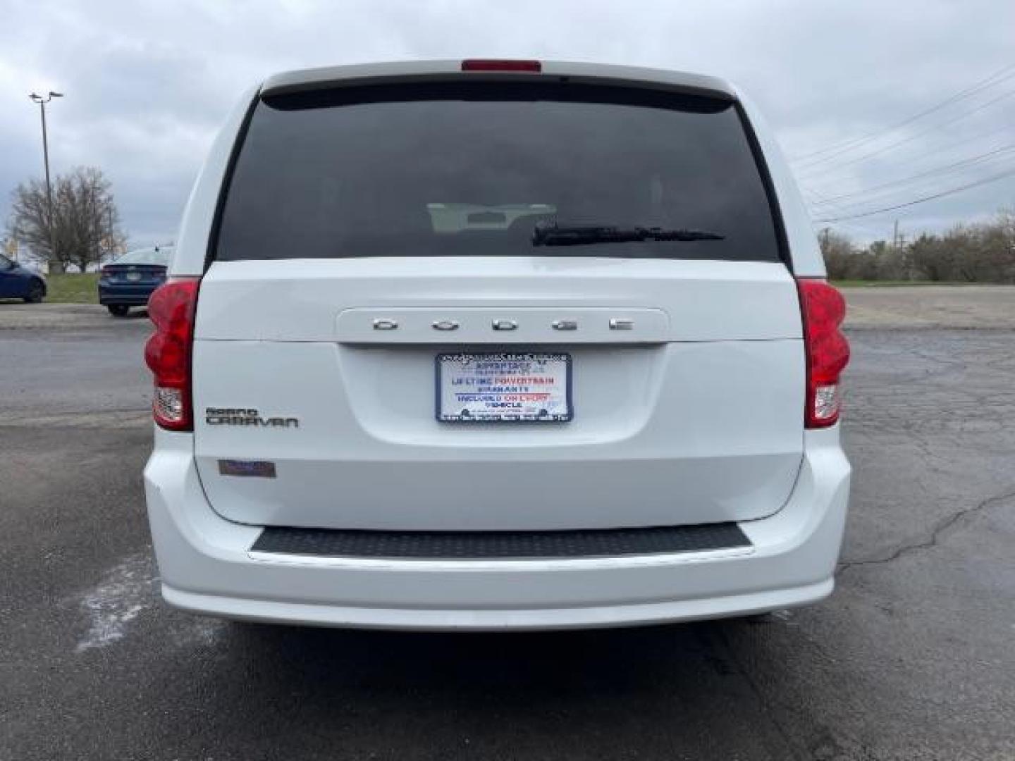 2014 Bright White Clearcoat Dodge Grand Caravan SE (2C4RDGBG9ER) with an 3.6L V6 DOHC 24V engine, 6-Speed Automatic transmission, located at 4508 South Dixie Dr, Moraine, OH, 45439, (937) 908-9800, 39.689976, -84.218452 - Photo#3