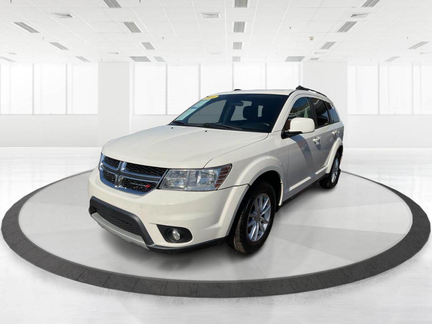 2014 Pearl White Tri-Coat Dodge Journey SXT (3C4PDCBG0ET) with an 3.6L V6 DOHC 24V engine, 6-Speed Automatic transmission, located at 8750 N County Rd 25A, Piqua, OH, 45356, (937) 908-9800, 40.164391, -84.232513 - 2014 Dodge Journey SXT - Photo#7