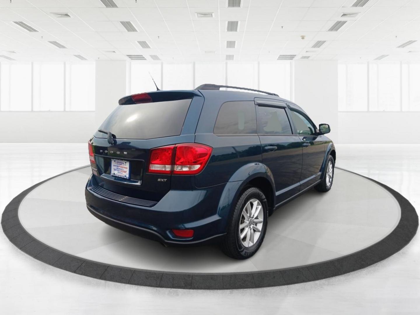 2014 Fathom Blue Pearlcoat Dodge Journey (3C4PDCBB1ET) with an 2.4L L6 DOHC 16V engine, 4-Speed Automatic transmission, located at 401 Woodman Dr, Riverside, OH, 45431, (937) 908-9800, 39.760899, -84.123421 - Photo#2