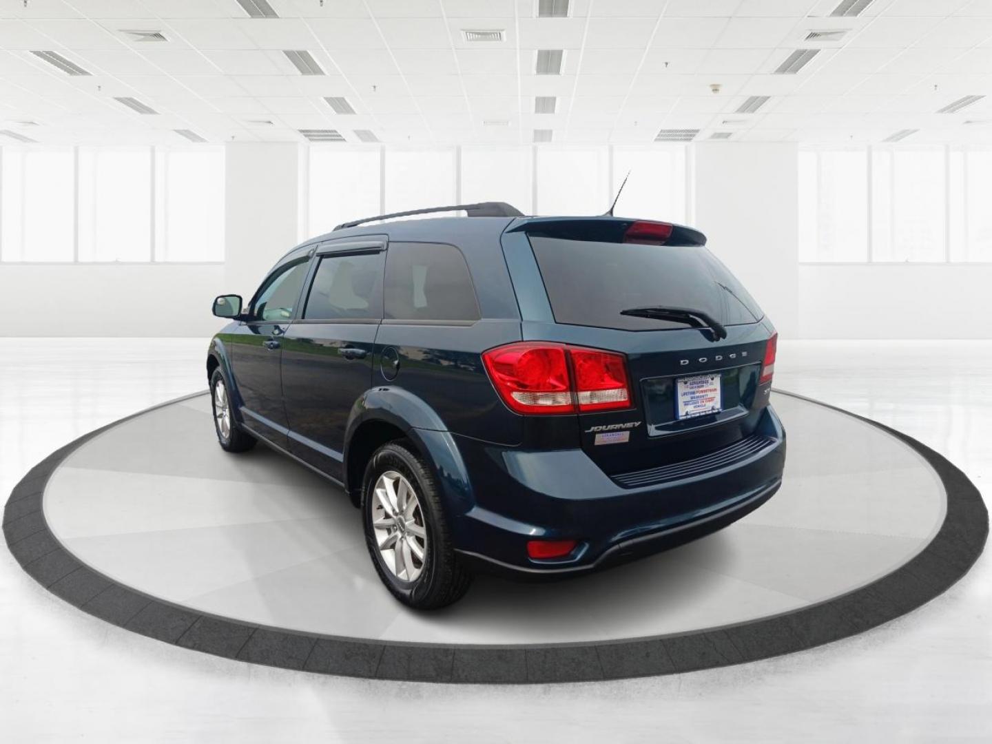 2014 Fathom Blue Pearlcoat Dodge Journey (3C4PDCBB1ET) with an 2.4L L6 DOHC 16V engine, 4-Speed Automatic transmission, located at 401 Woodman Dr, Riverside, OH, 45431, (937) 908-9800, 39.760899, -84.123421 - Photo#4