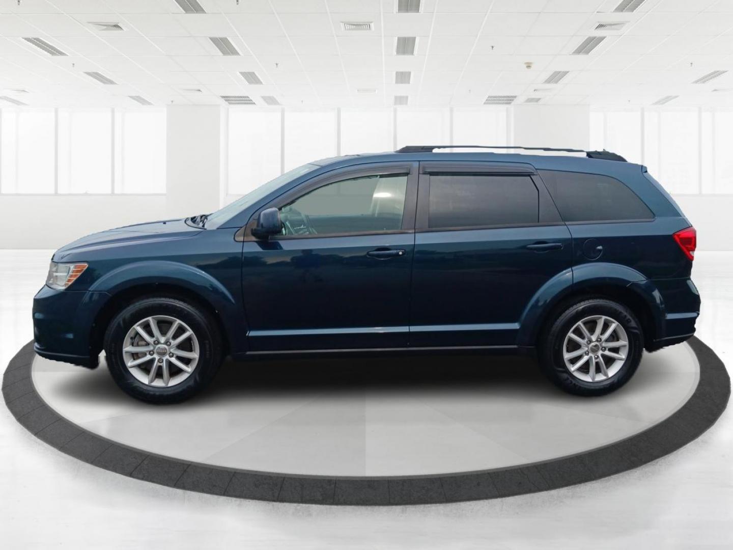 2014 Fathom Blue Pearlcoat Dodge Journey (3C4PDCBB1ET) with an 2.4L L6 DOHC 16V engine, 4-Speed Automatic transmission, located at 401 Woodman Dr, Riverside, OH, 45431, (937) 908-9800, 39.760899, -84.123421 - Photo#5