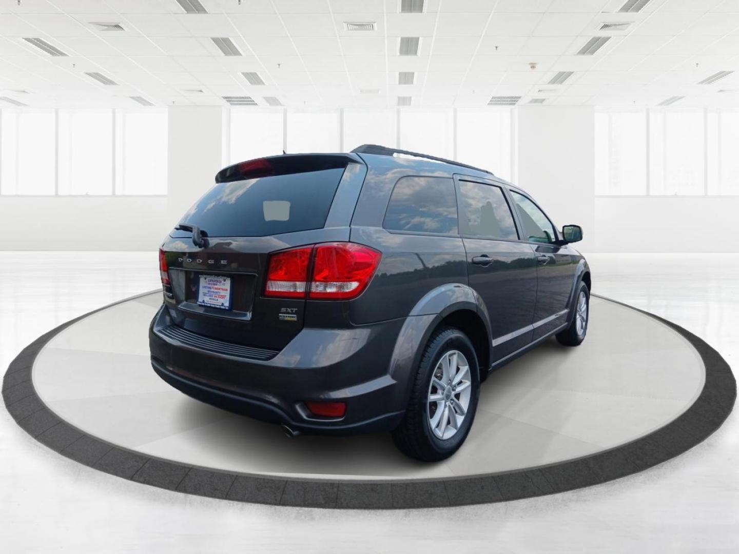 2014 Granite Crystal Met CC Dodge Journey (3C4PDCBG7ET) with an 3.6L V6 DOHC 24V engine, 6-Speed Automatic transmission, located at 880 E. National Road, Vandalia, OH, 45377, (937) 908-9800, 39.891918, -84.183594 - Photo#2